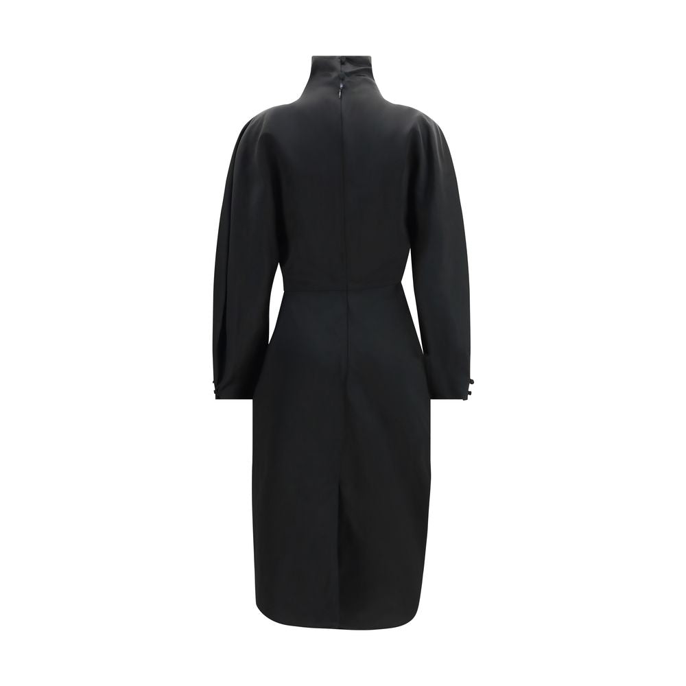 Experience the exquisite allure of the Khaite Black Acetate Cocktail Dress, a masterful blend of elegance and artistry, perfect for unforgettable moments.