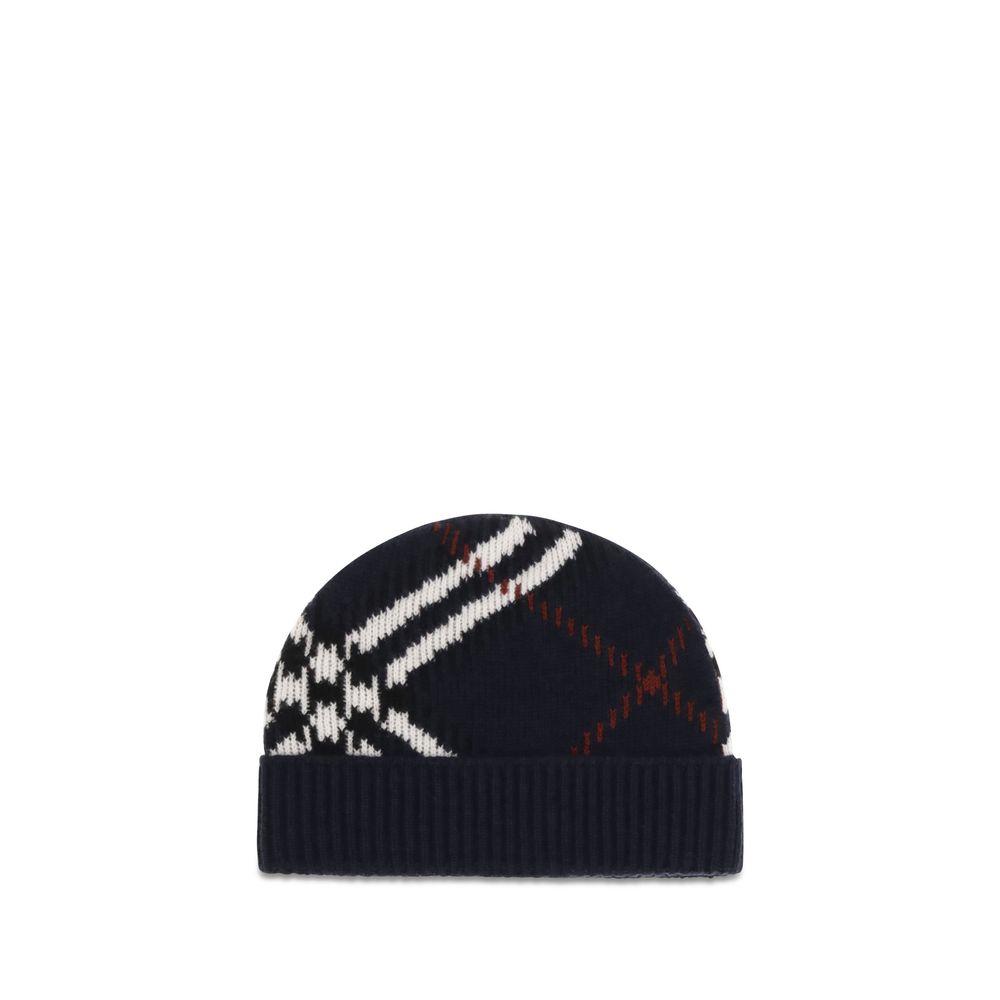 Indulge in the exquisite Burberry Blue Cashmere Beanie, a luxurious blend of cashmere crafted at a historic Scottish mill, embodying timeless elegance and warmth.