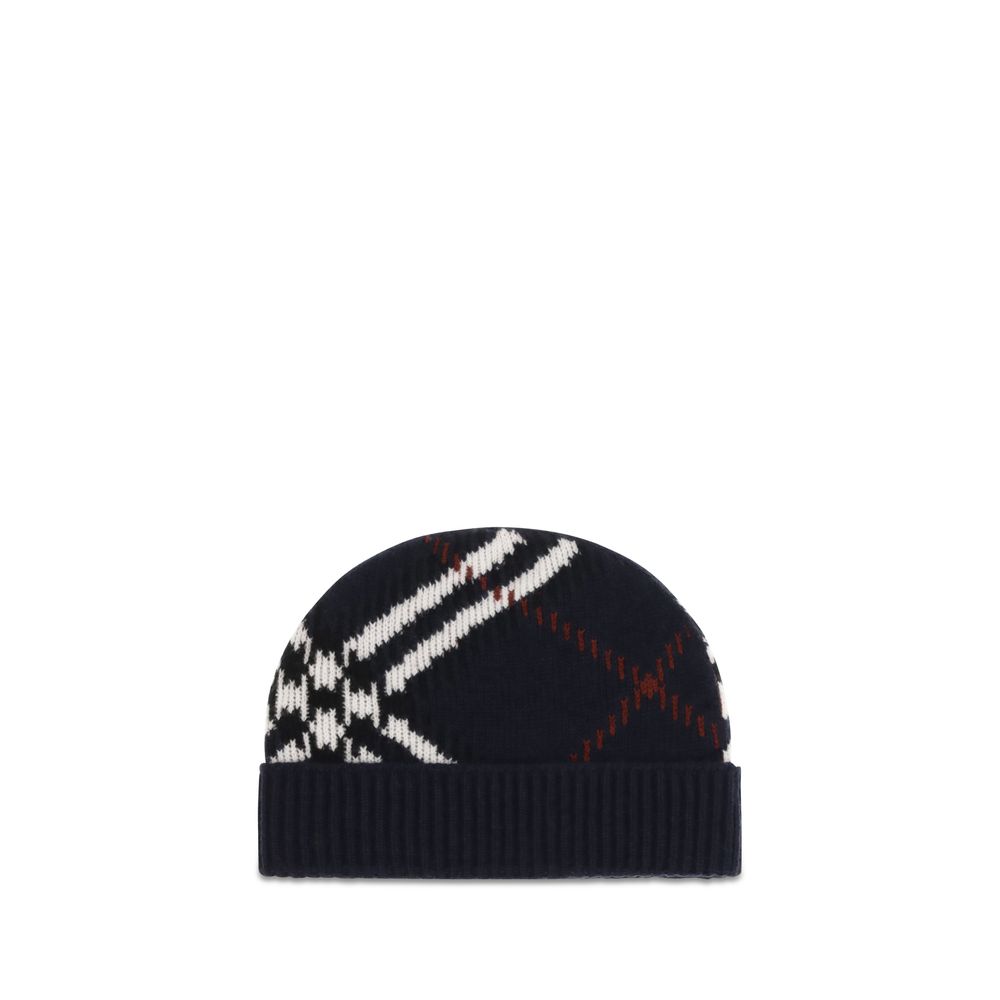 Indulge in the exquisite Burberry Blue Cashmere Beanie, a masterpiece of soft cashmere-blend yarn, embodying timeless elegance and unrivaled craftsmanship for discerning individuals.