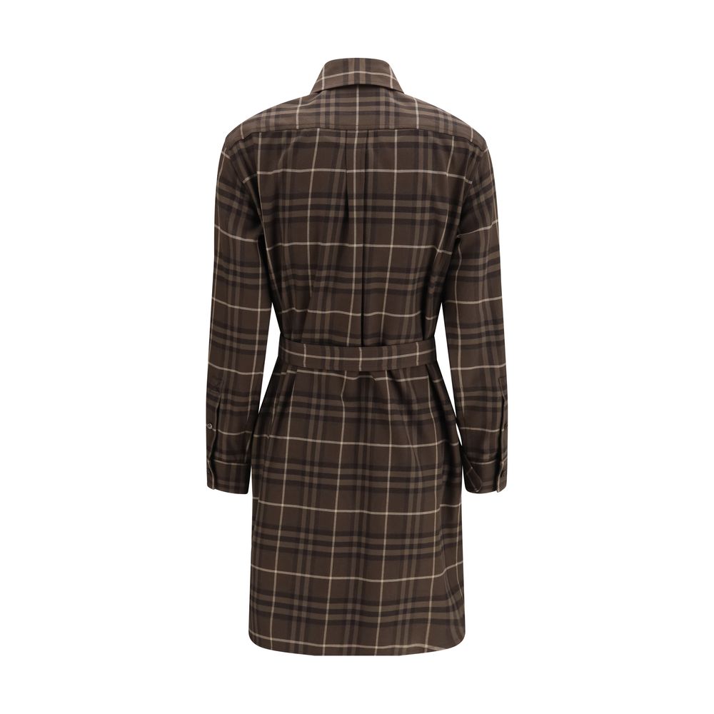 Indulge in the exquisite Burberry Brown Cotton Casual Dress, a masterpiece of craftsmanship featuring the iconic House Check pattern, perfect for elevating your wardrobe with timeless elegance.