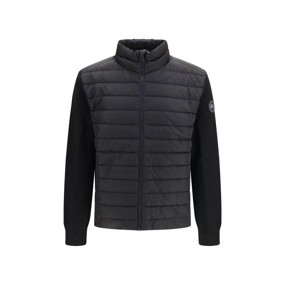 Indulge in the exquisite craftsmanship of the Canada Goose Black Recycled Polyamide Full-Length Jacket, where luxurious merino wool meets down-filled elegance for unparalleled warmth and style.