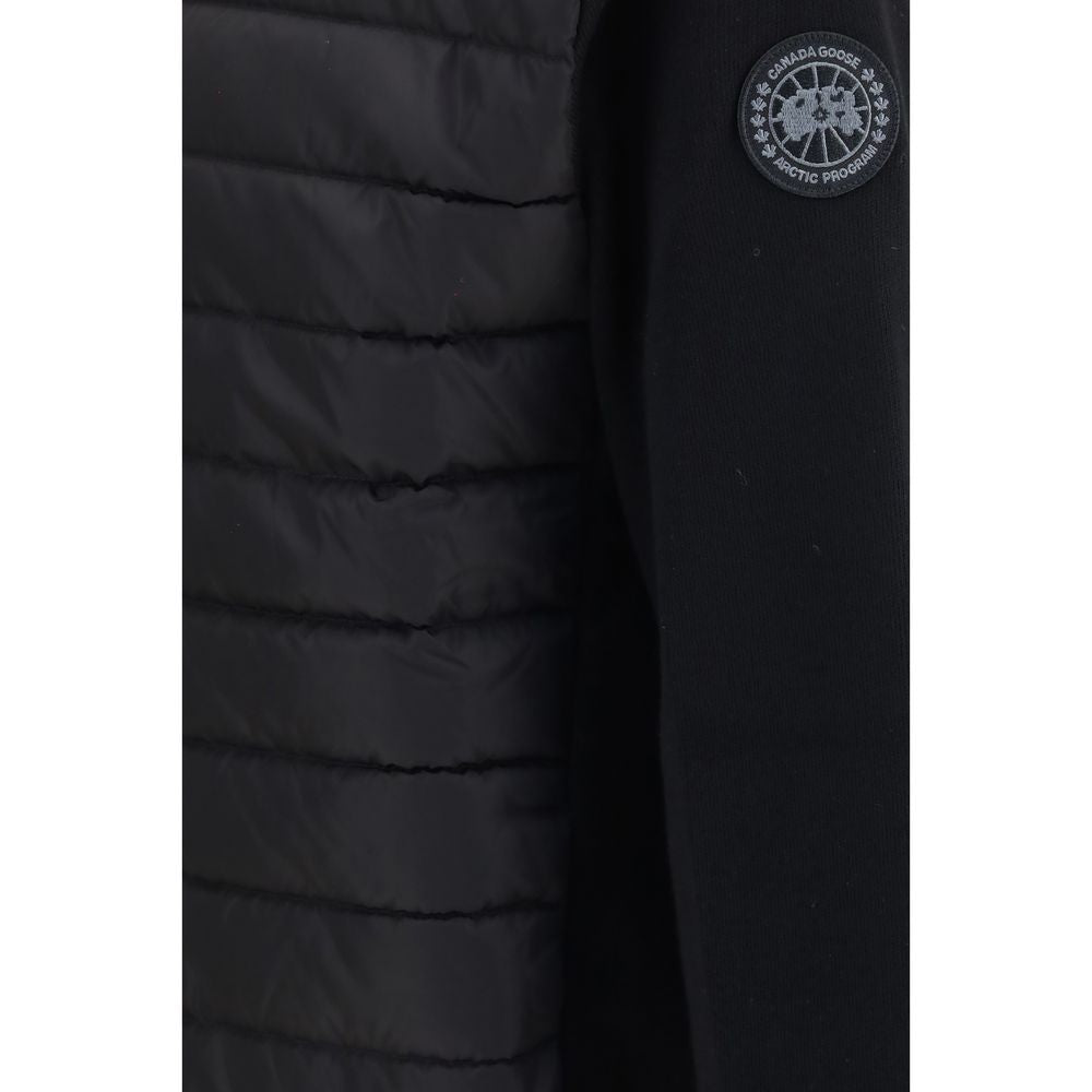 Indulge in the elegance of the Canada Goose Black Recycled Polyamide Full-Length Jacket, where luxurious merino wool meets exquisite down-filled craftsmanship for unparalleled warmth and style.