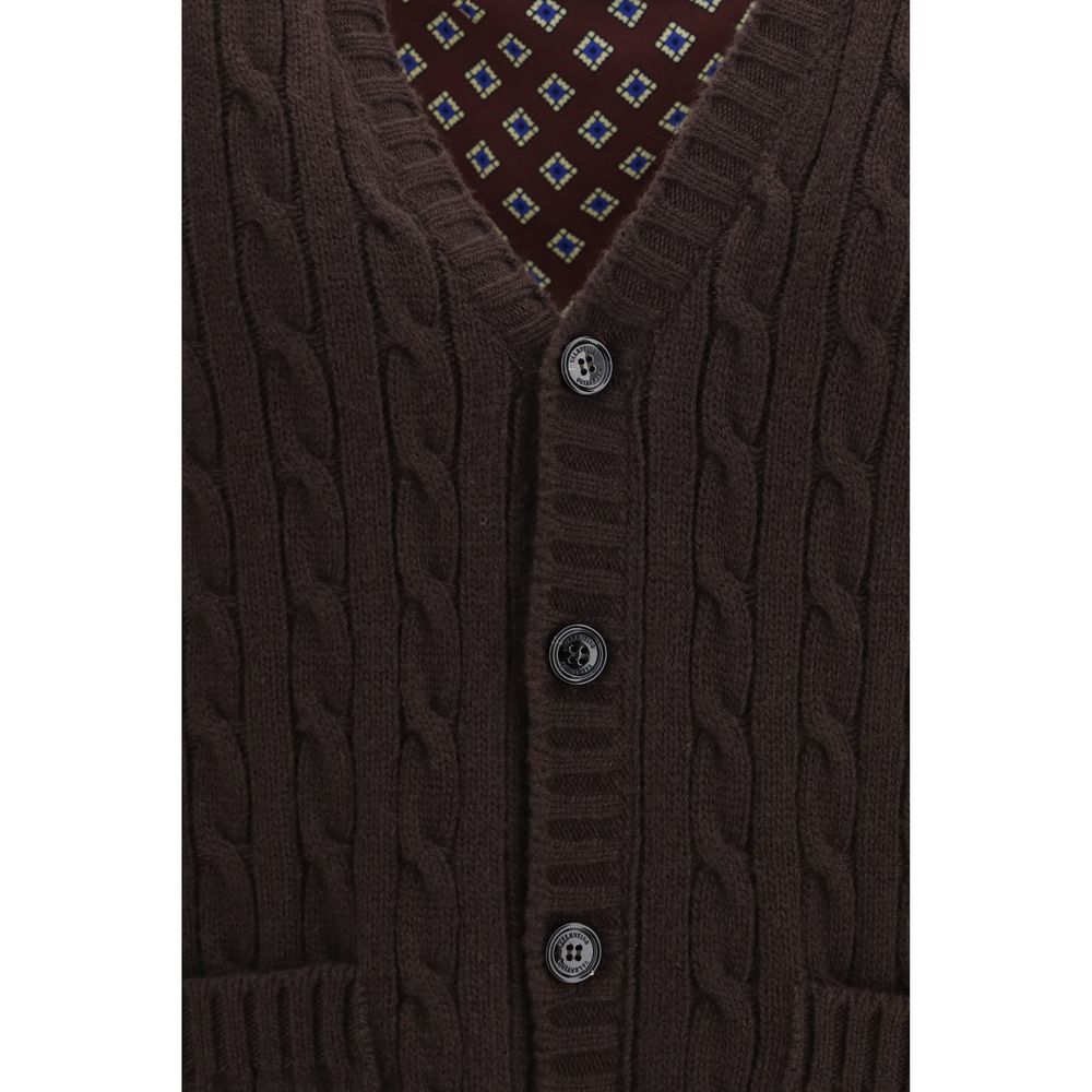 Indulge in the exquisite Valentino Garavani Brown Wool Oves Aries Cardigan, crafted from 100% Merino wool, where timeless elegance meets luxurious comfort for the discerning individual.