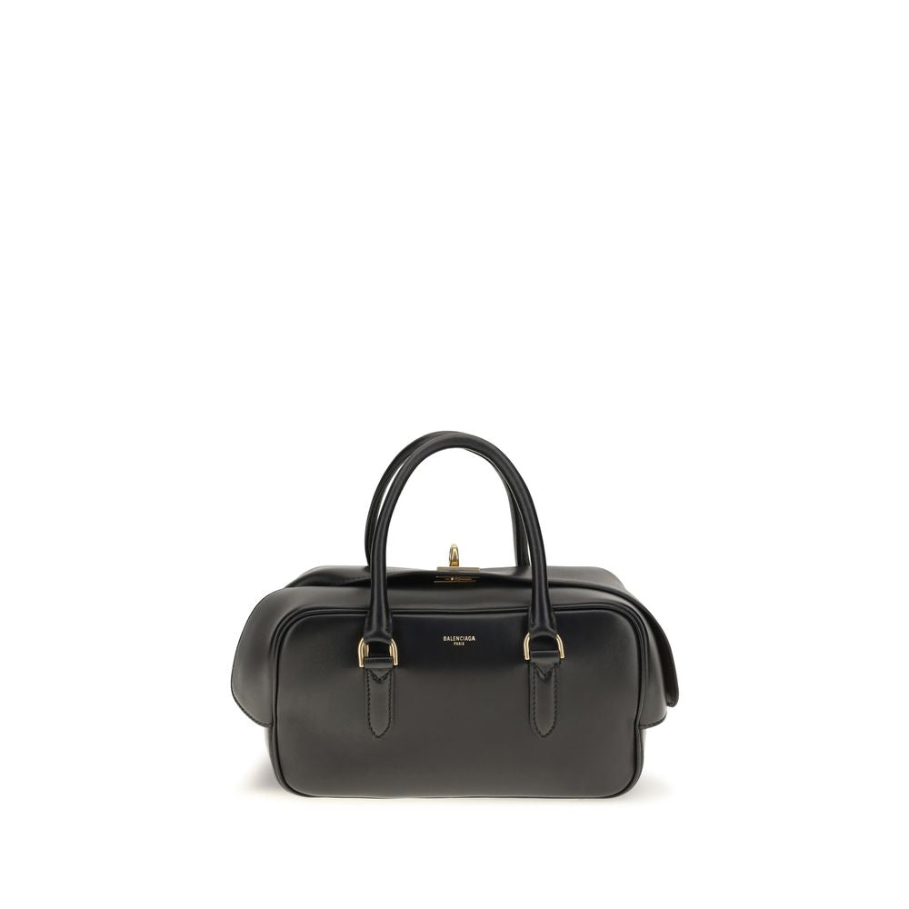 Discover the Balenciaga Black Lamb Leather Handbag, a masterpiece of Italian craftsmanship that embodies luxury and sophistication for the discerning individual.