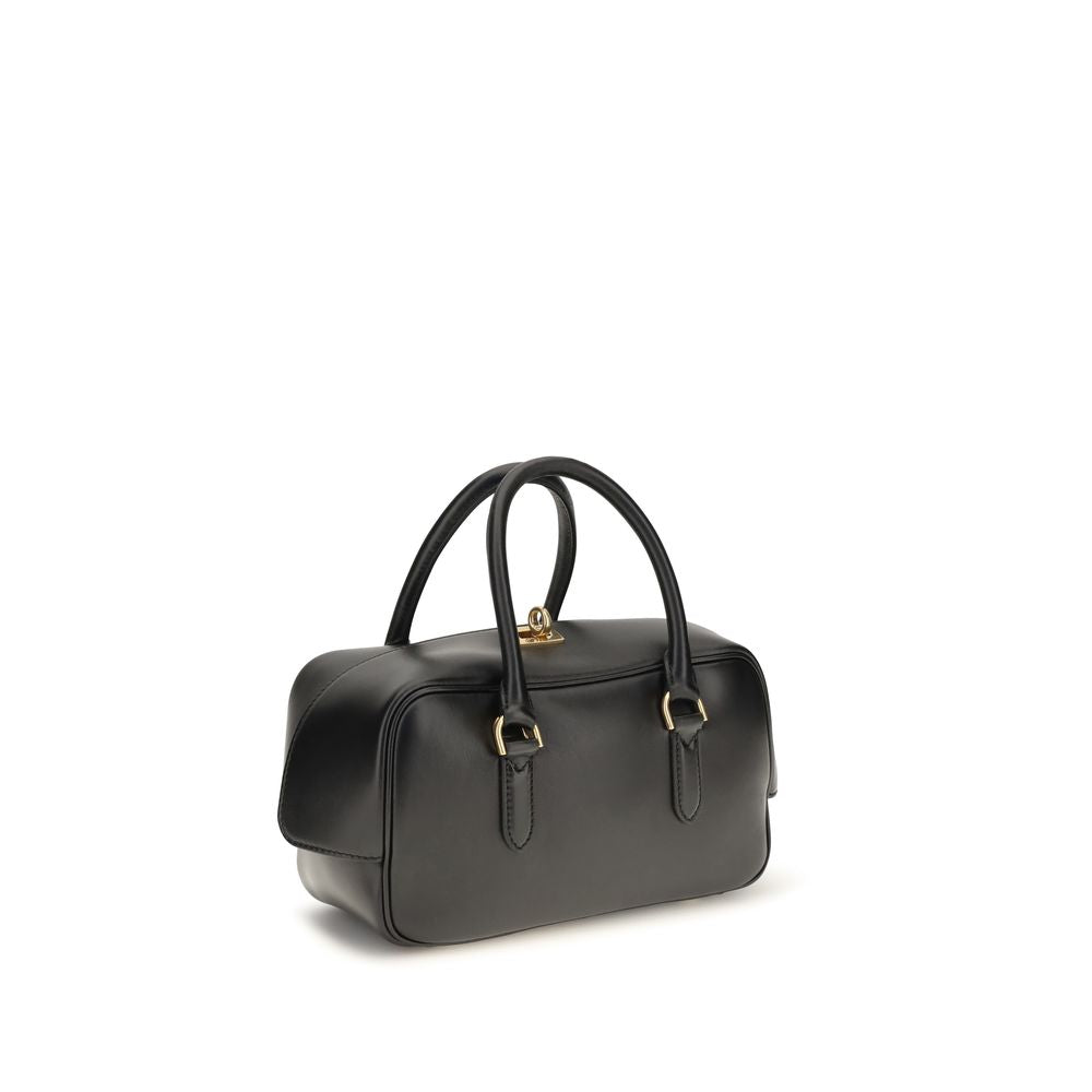 Discover the Balenciaga Black Lamb Leather Handbag, a masterpiece of Italian craftsmanship that embodies luxury and sophistication for the discerning individual.