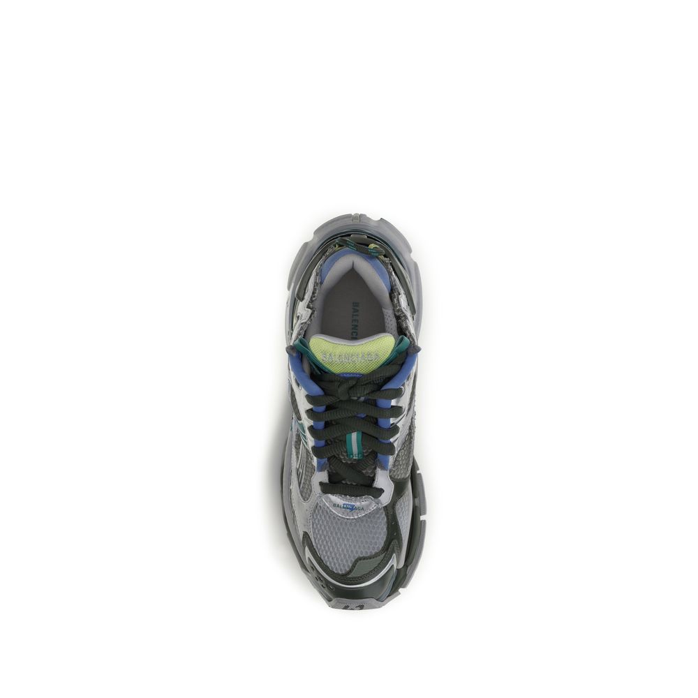 Elevate your style with Balenciaga's Runner Gradient Sneakers, crafted from premium materials for a distinctive, luxurious look that embodies sophistication and allure.