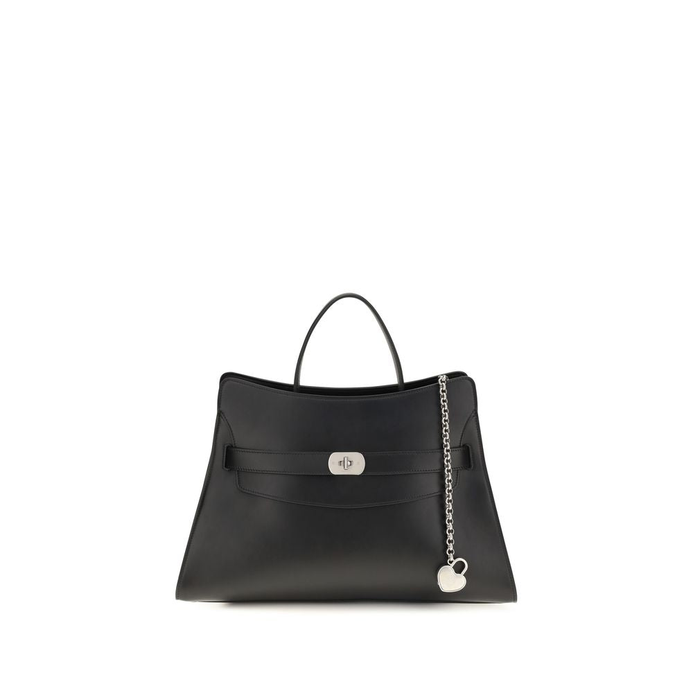 Discover the Alexander McQueen Black Calf Leather Bos Taurus Shoulder Bag, a masterpiece of architectural elegance and exquisite craftsmanship, perfect for the discerning individual.