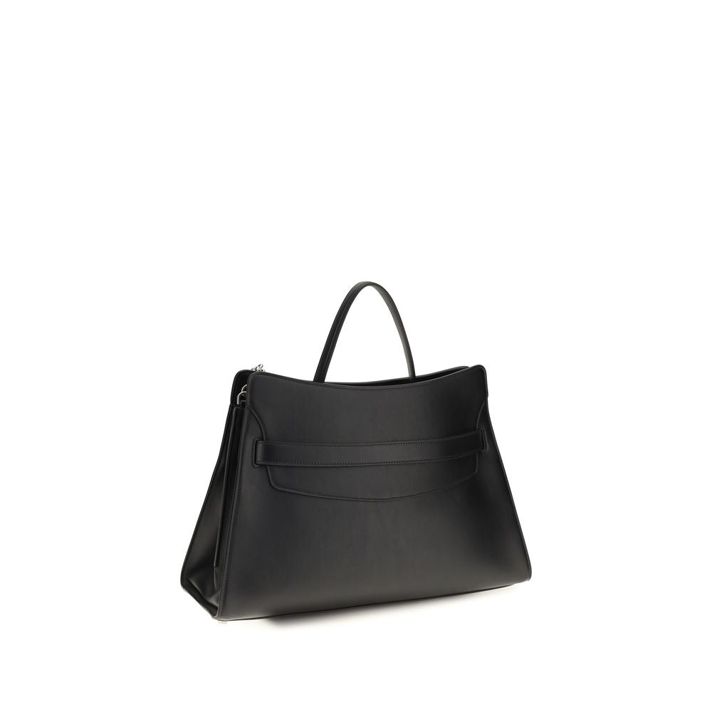 Discover the Alexander McQueen Black Calf Leather Bos Taurus Shoulder Bag, a masterpiece of Italian craftsmanship that elevates your style with its architectural elegance and iconic details.