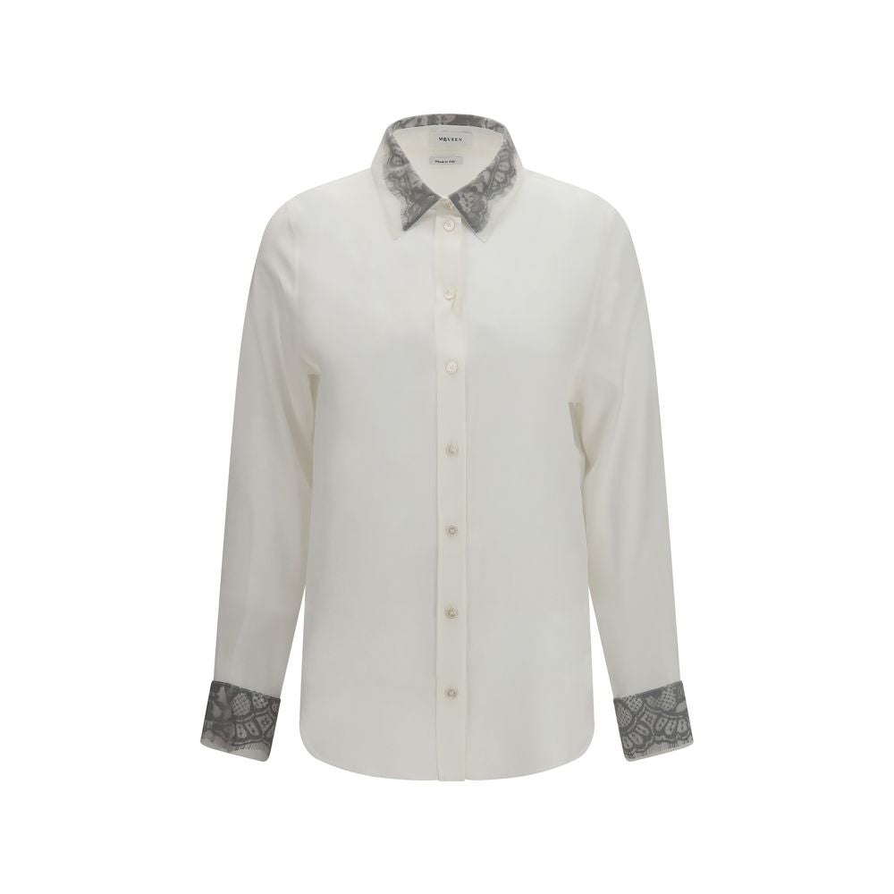 Indulge in the exquisite craftsmanship of the Alexander McQueen White Silk Dress Shirt, a luxurious blend of silk and floral lace, perfect for the discerning connoisseur.