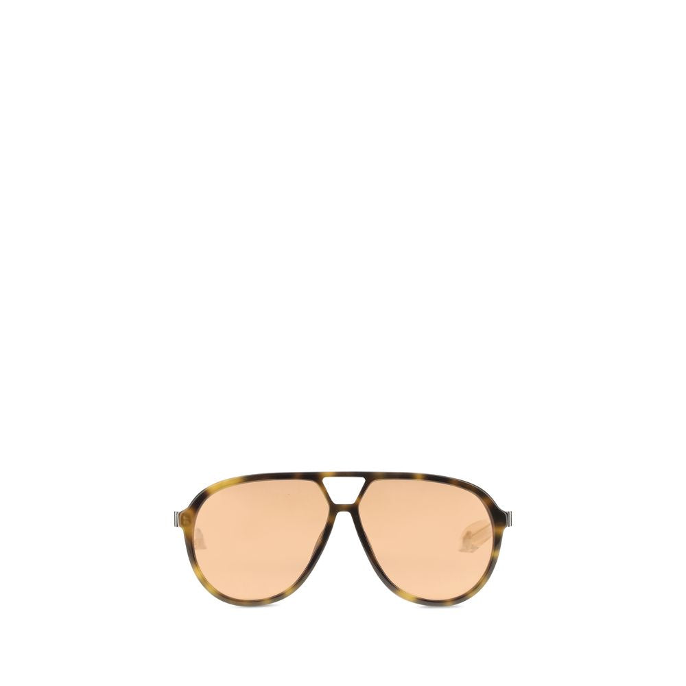 Indulge in the bold elegance of Alexander McQueen's Brown Acetate Sunglasses, crafted in Italy with a contemporary double-bridge design that embodies luxury and sophistication.