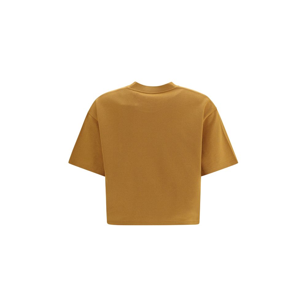Indulge in the exquisite Cassandre oversized T-Shirt by Saint Laurent, crafted from premium cotton, embodying effortless luxury and timeless elegance for the discerning individual.