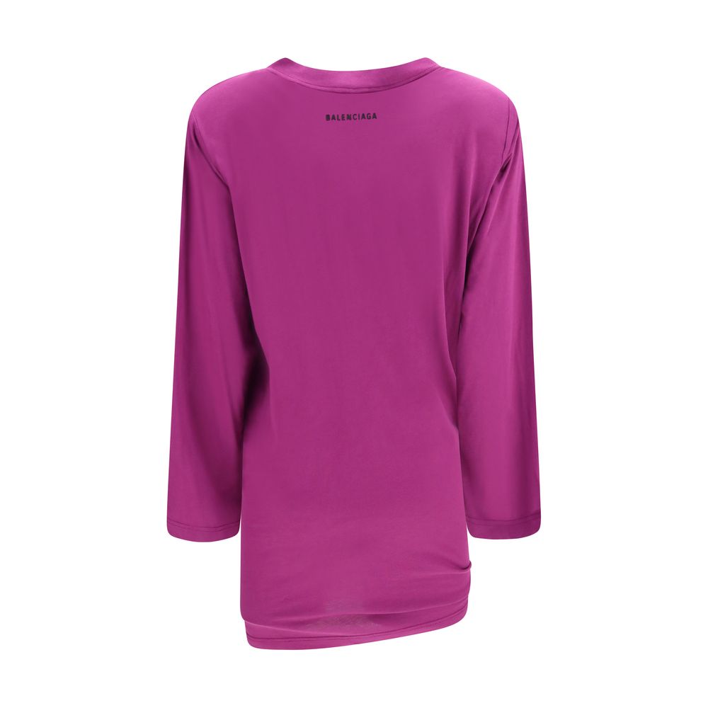 Indulge in the allure of Balenciaga's Purple Cotton Long Sleeve T-Shirt, where exquisite craftsmanship meets a modern silhouette, perfect for the discerning fashion connoisseur.