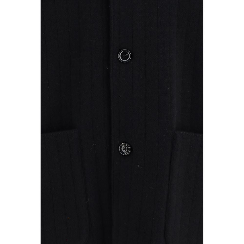 Discover the Lardini Black Wool Oves Aries Full-Length Jacket, a masterpiece of refined craftsmanship in ribbed wool, embodying timeless elegance for the discerning individual.
