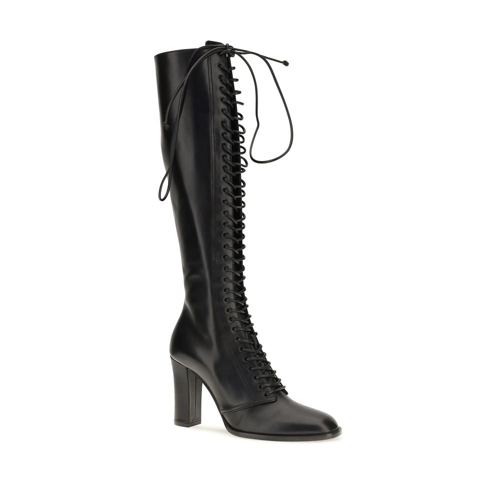 Elevate your style with Dolce & Gabbana's Black Calf Leather Bos Taurus Lace-Up Boots, a testament to Italian craftsmanship and sophisticated allure for the discerning individual.