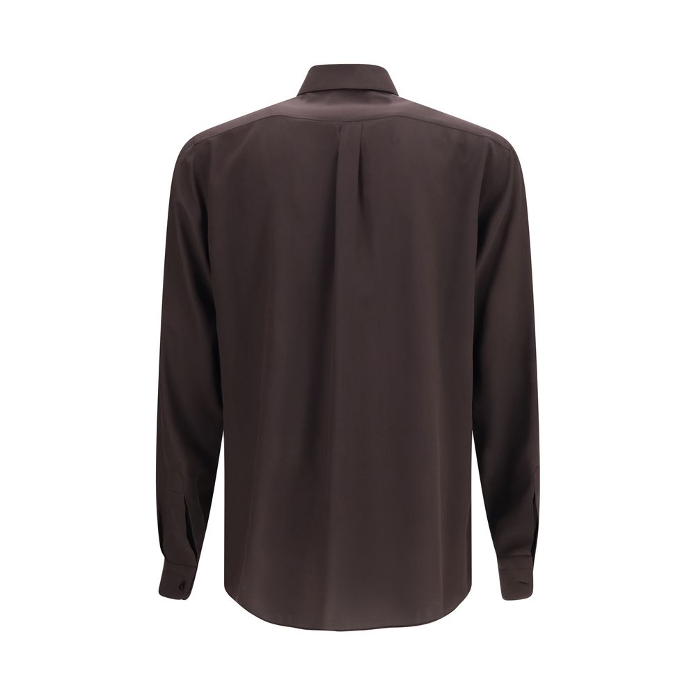 Indulge in the elegance of the Dolce & Gabbana Brown Silk Shirt, a masterpiece of Italian craftsmanship that embodies refined luxury and timeless sophistication.