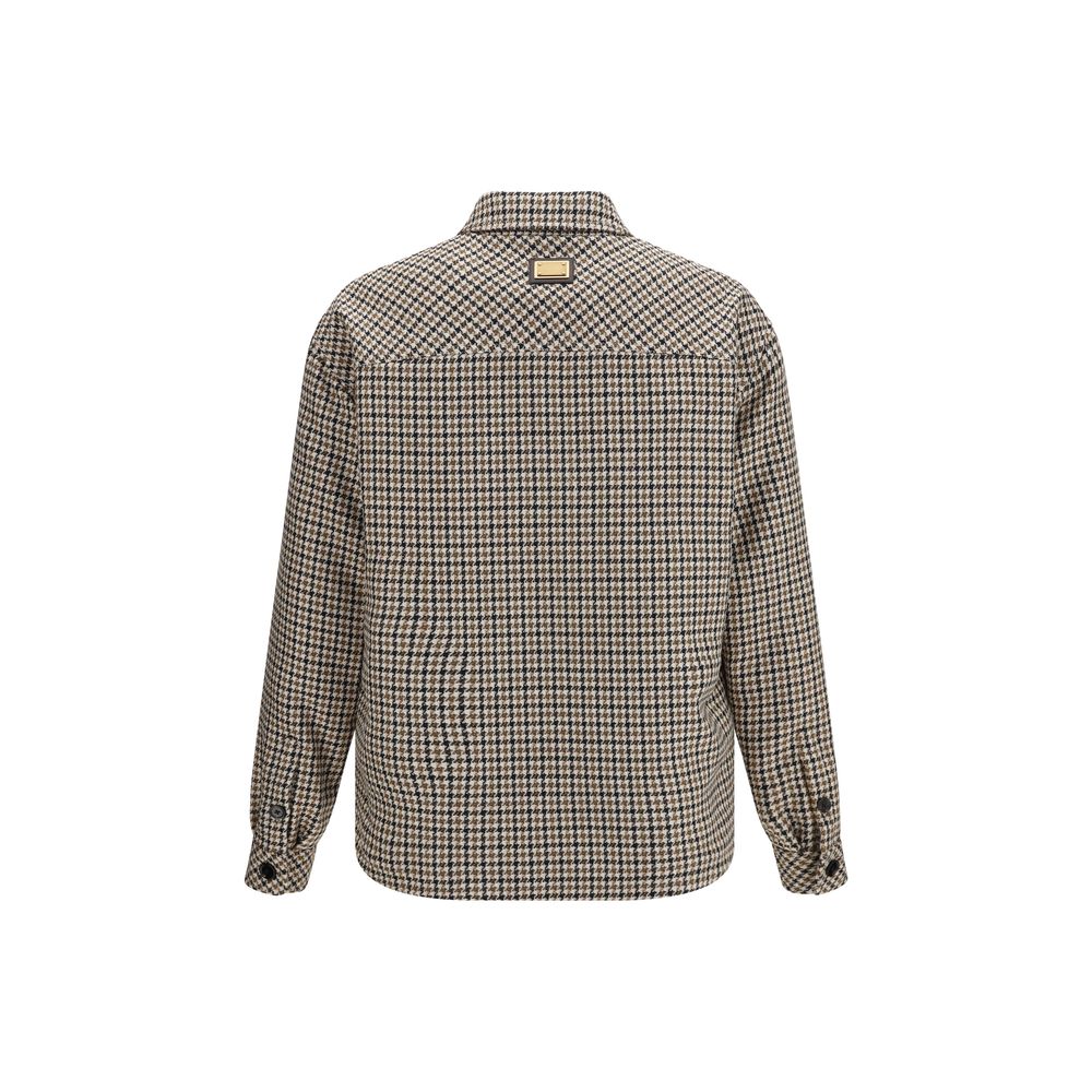 Indulge in the exquisite Dolce & Gabbana Brown Wool Oves Aries Full-Length Jacket, a masterful blend of houndstooth elegance and Italian craftsmanship for the discerning connoisseur.