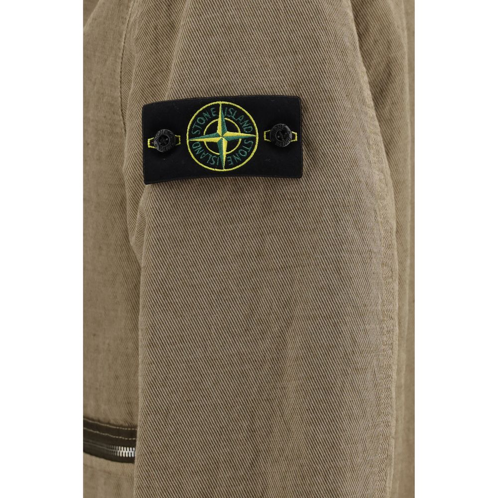 Elevate your style with the Stone Island Brown Cotton Full-Length Jacket, a blend of luxurious cotton and wool, embodying sophistication and warmth for the discerning individual.