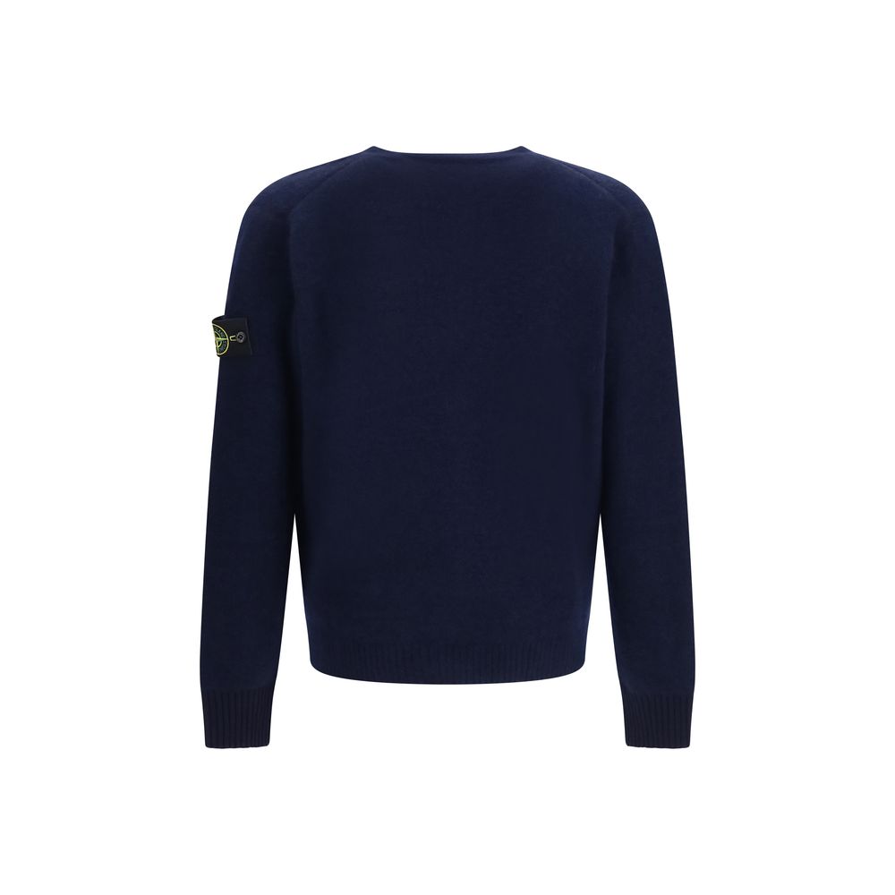 Indulge in the Stone Island Blue Alpaca Vicugna Pacos Cardigan, where luxurious craftsmanship meets a versatile silhouette, elevating your wardrobe with timeless elegance.