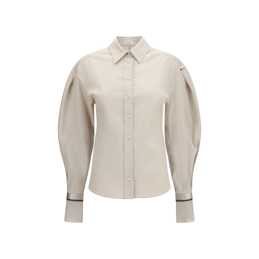 Elevate your wardrobe with the Brunello Cucinelli Beige Cotton Shirt, a masterpiece of refined craftsmanship and luxurious silk details, perfect for the discerning individual.