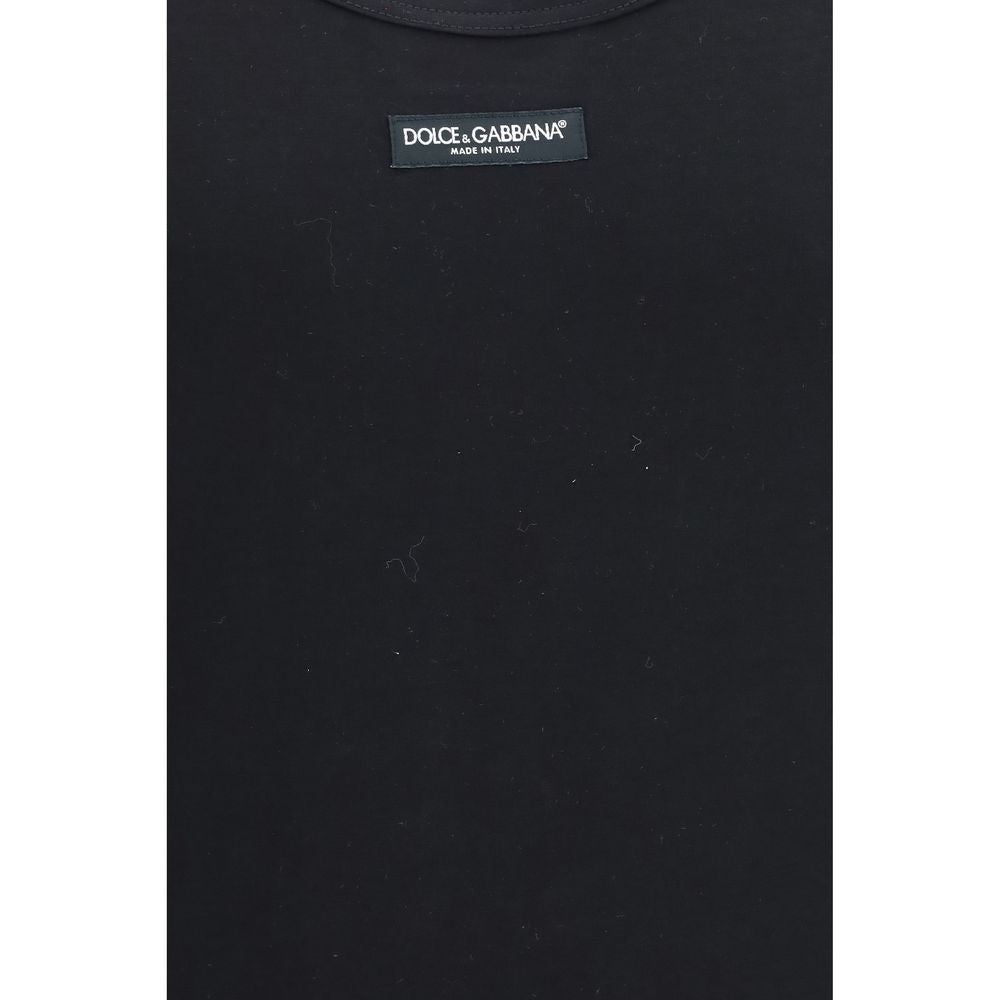 Discover the Dolce & Gabbana Black Cotton Top, a seamless blend of elegance and comfort, crafted from luxurious stretch cotton for an effortlessly refined silhouette.