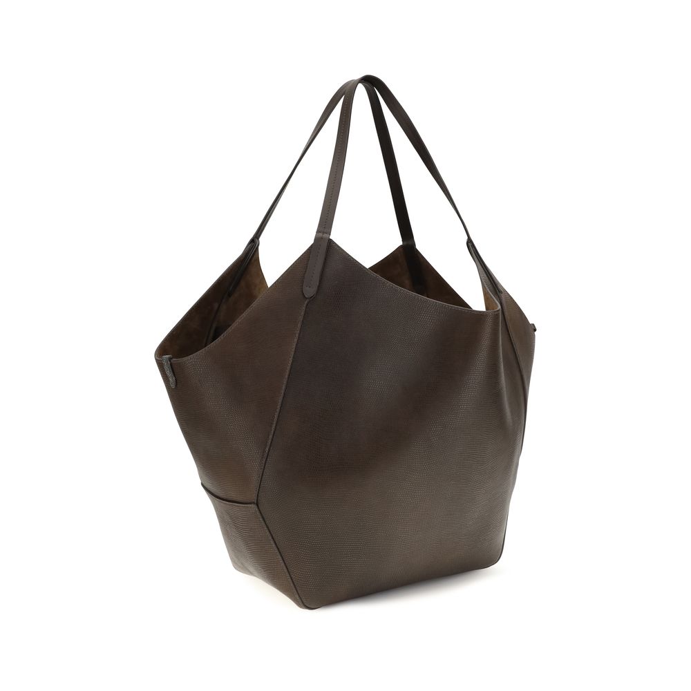Indulge in the exquisite Brunello Cucinelli Brown Calf Leather Bos Taurus Handbag, a masterpiece of Italian craftsmanship that embodies timeless elegance and sophistication.
