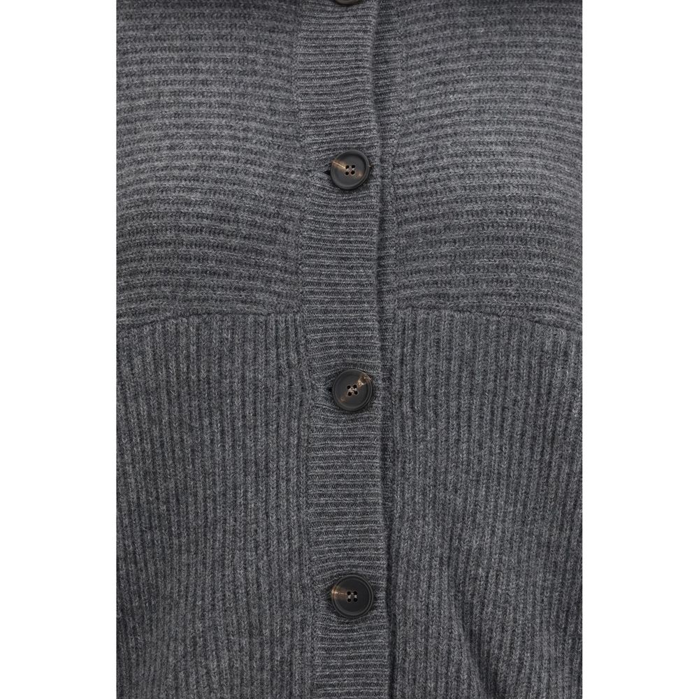 Indulge in the exquisite Brunello Cucinelli Gray Cashmere Cardigan, a masterpiece of soft cashmere and refined design, perfect for elevating your wardrobe with timeless luxury.