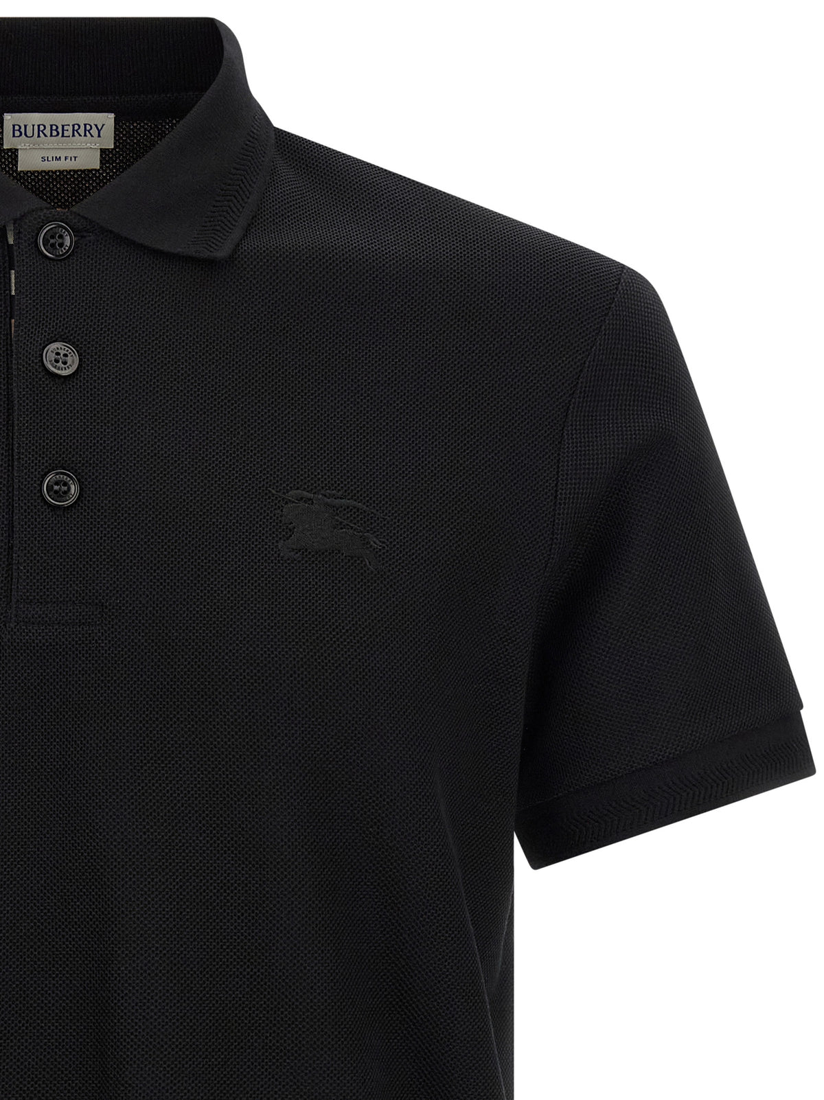 Discover the Burberry Black Cotton Polo Shirt from the ‘Eddie’ collection, where timeless elegance meets exquisite craftsmanship, elevating your wardrobe to new heights of luxury.