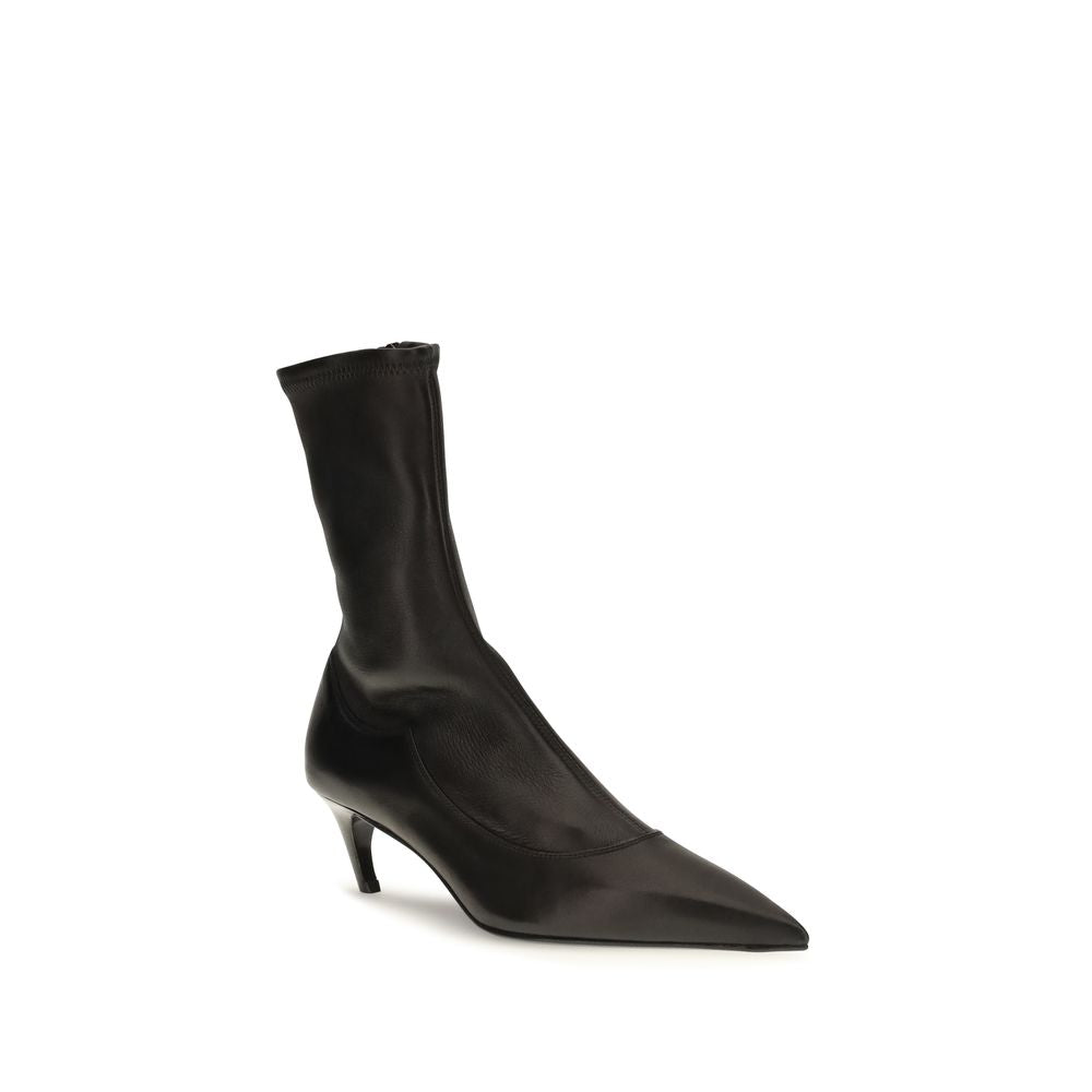 Step into sophistication with Khaite's Black Calf Leather Bos Taurus Ankle Boots, crafted from smooth nappa leather for a striking silhouette that embodies luxury and elegance.