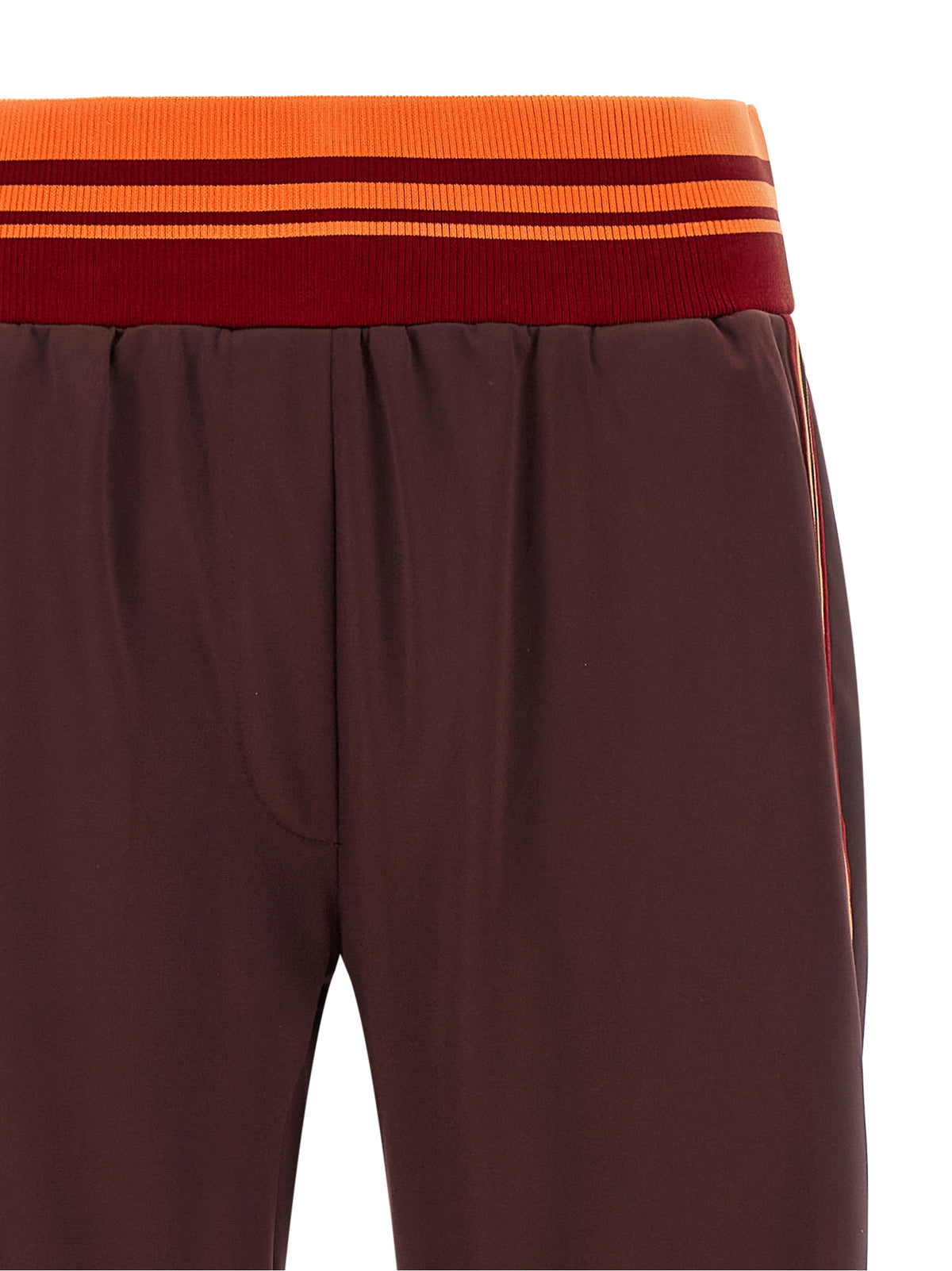 Experience the allure of Dries Van Noten's Brown Polyester Athletic Pants, where exquisite craftsmanship meets luxurious comfort, redefining modern elegance for the discerning individual.