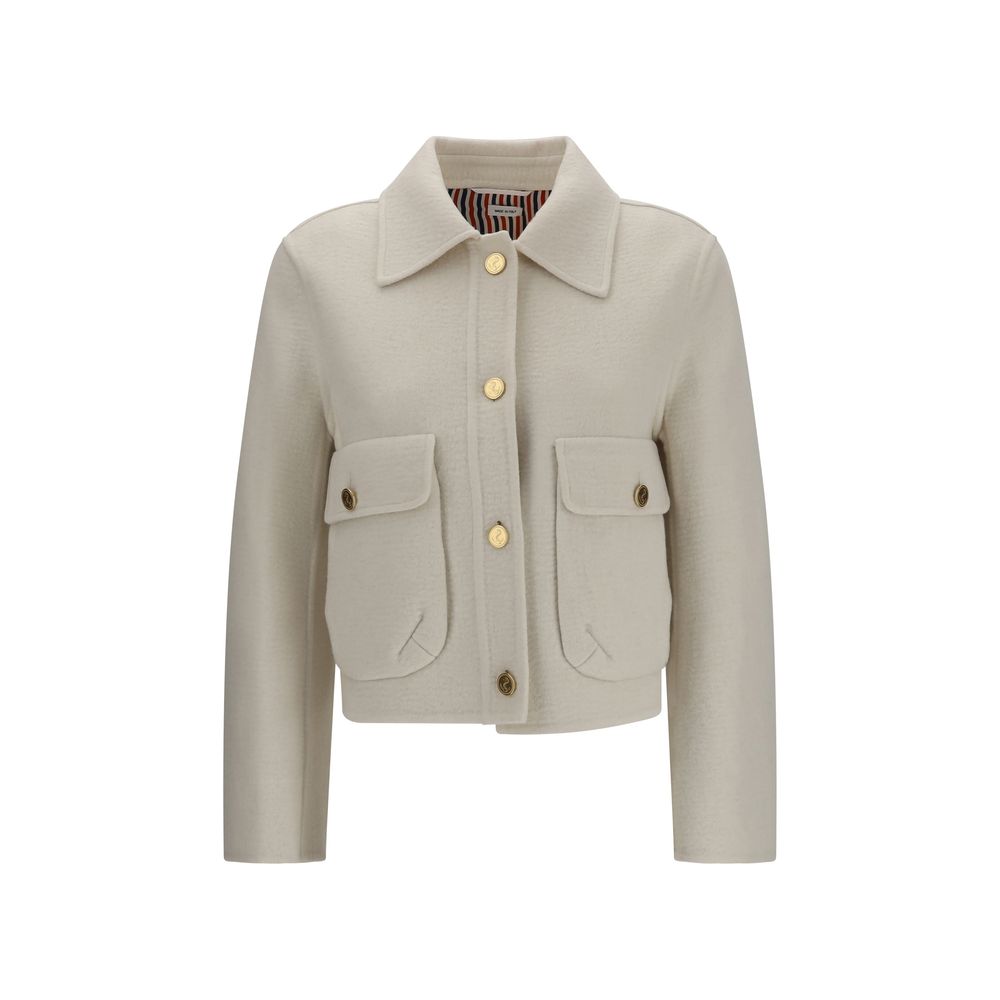 Elevate your wardrobe with the Thom Browne Beige Wool Oves Aries Jacket, a masterpiece of 90% Merino Wool and 10% Kashmir, embodying timeless elegance and refined sophistication.