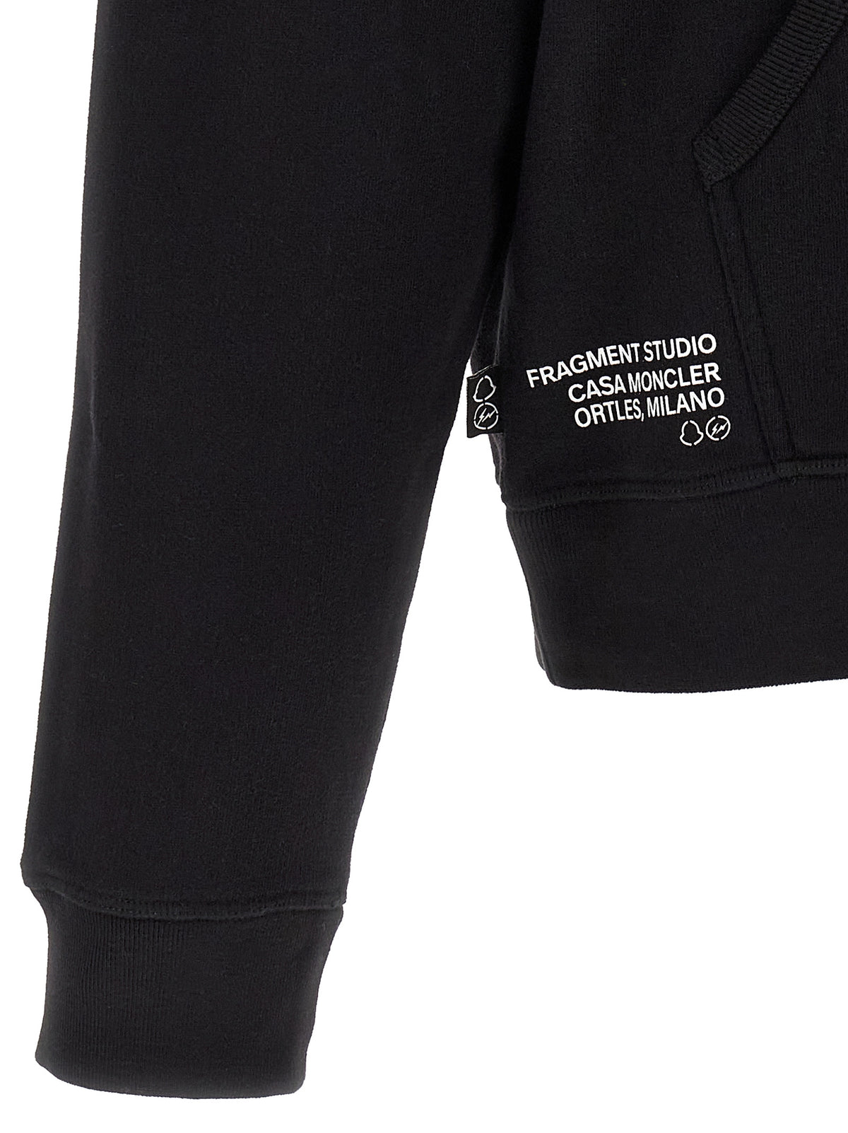 Elevate your wardrobe with the MONCLER GENIUS Black Cotton Sweatshirt, a luxurious blend of comfort and style, perfect for the discerning individual.