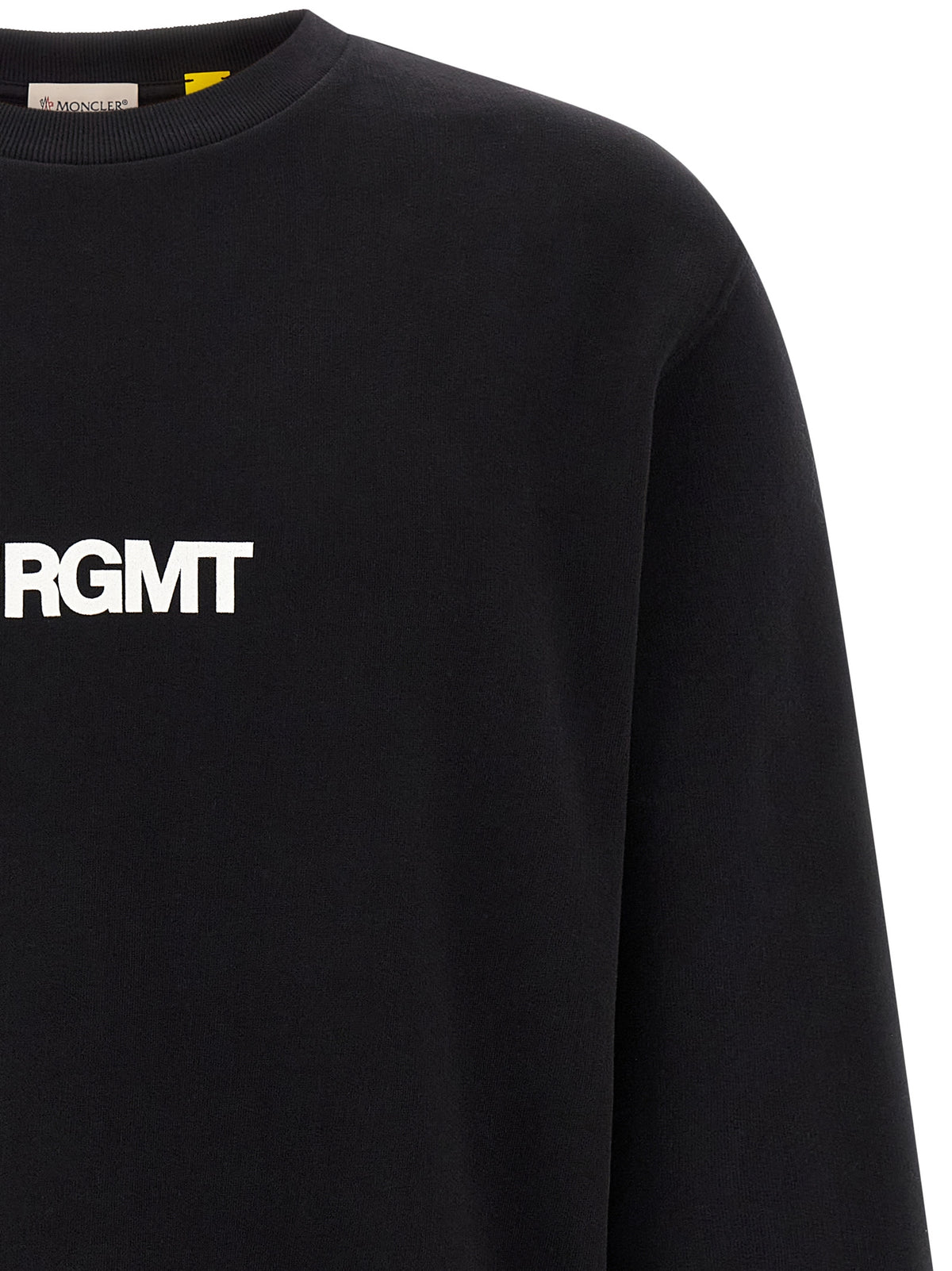 Elevate your wardrobe with the MONCLER GENIUS Black Cotton Sweatshirt, a masterpiece of urban elegance crafted from 100% cotton, embodying sophistication and versatility.