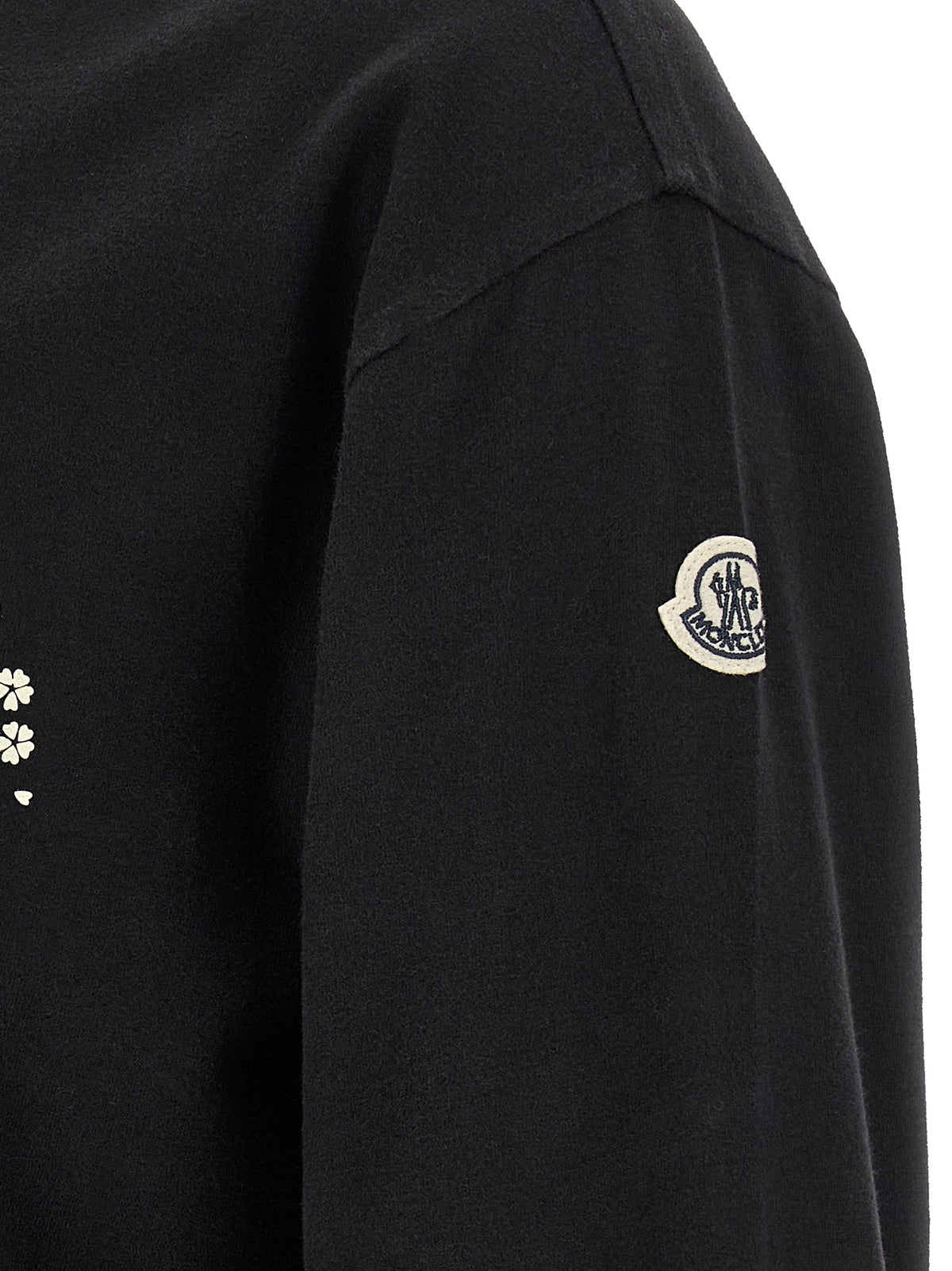 Elevate your wardrobe with the Moncler Genius Black Cotton T-Shirt, crafted from luxurious brushed cotton, merging cultural sophistication with contemporary style.