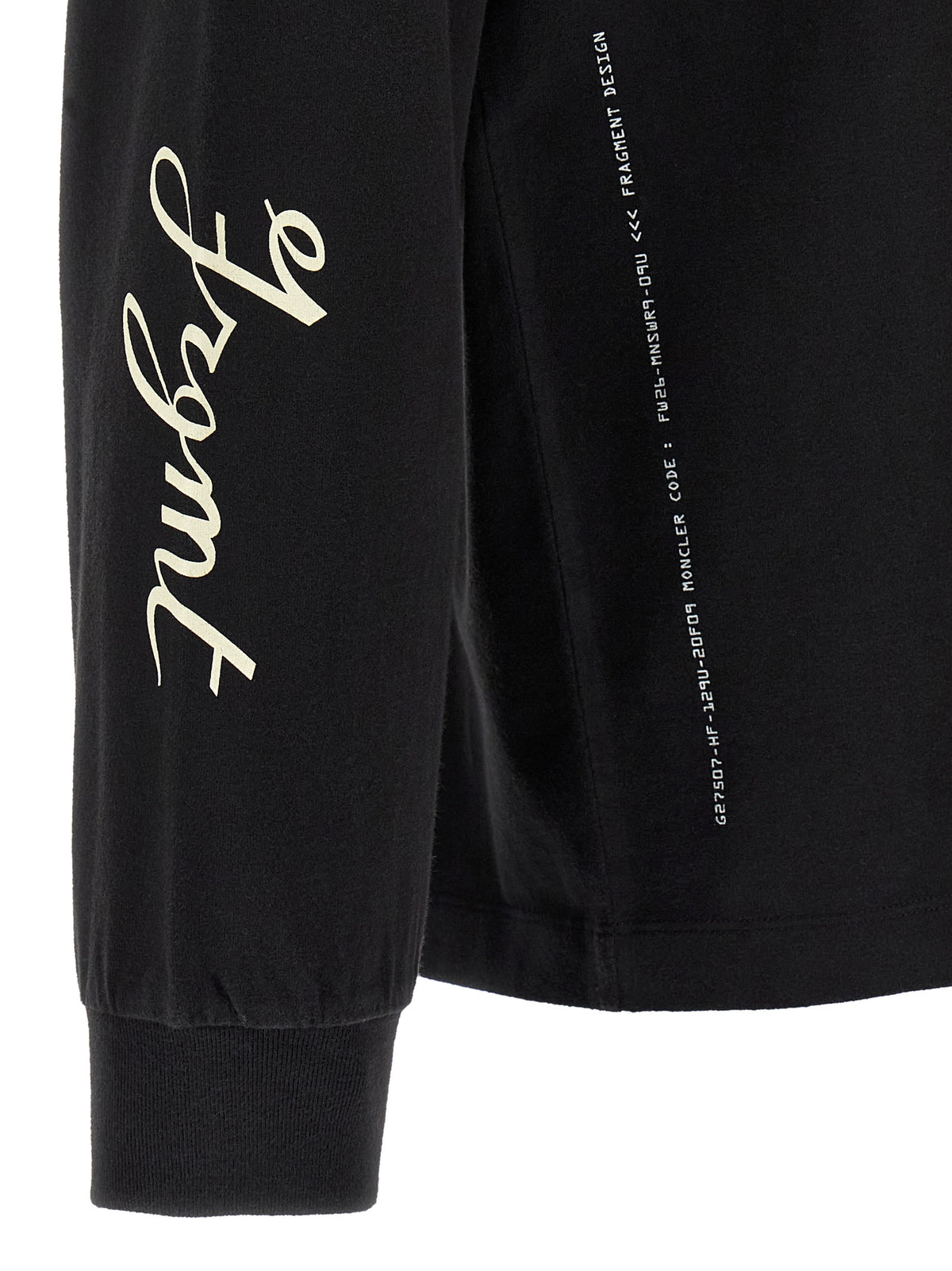 Elevate your wardrobe with the Moncler Genius Black Cotton T-Shirt, a luxurious blend of brushed cotton and dynamic artistry, perfect for the discerning individual.