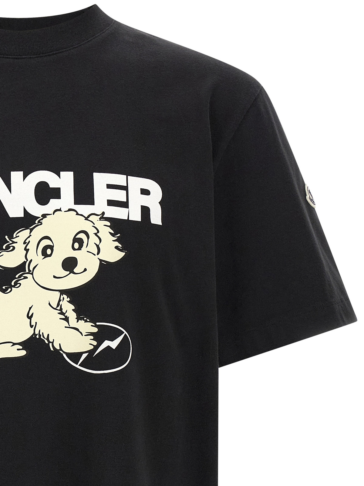 Experience the epitome of luxury with the Moncler Genius Black Cotton T-Shirt, crafted from soft brushed cotton, merging avant-garde style with relaxed elegance for the discerning individual.
