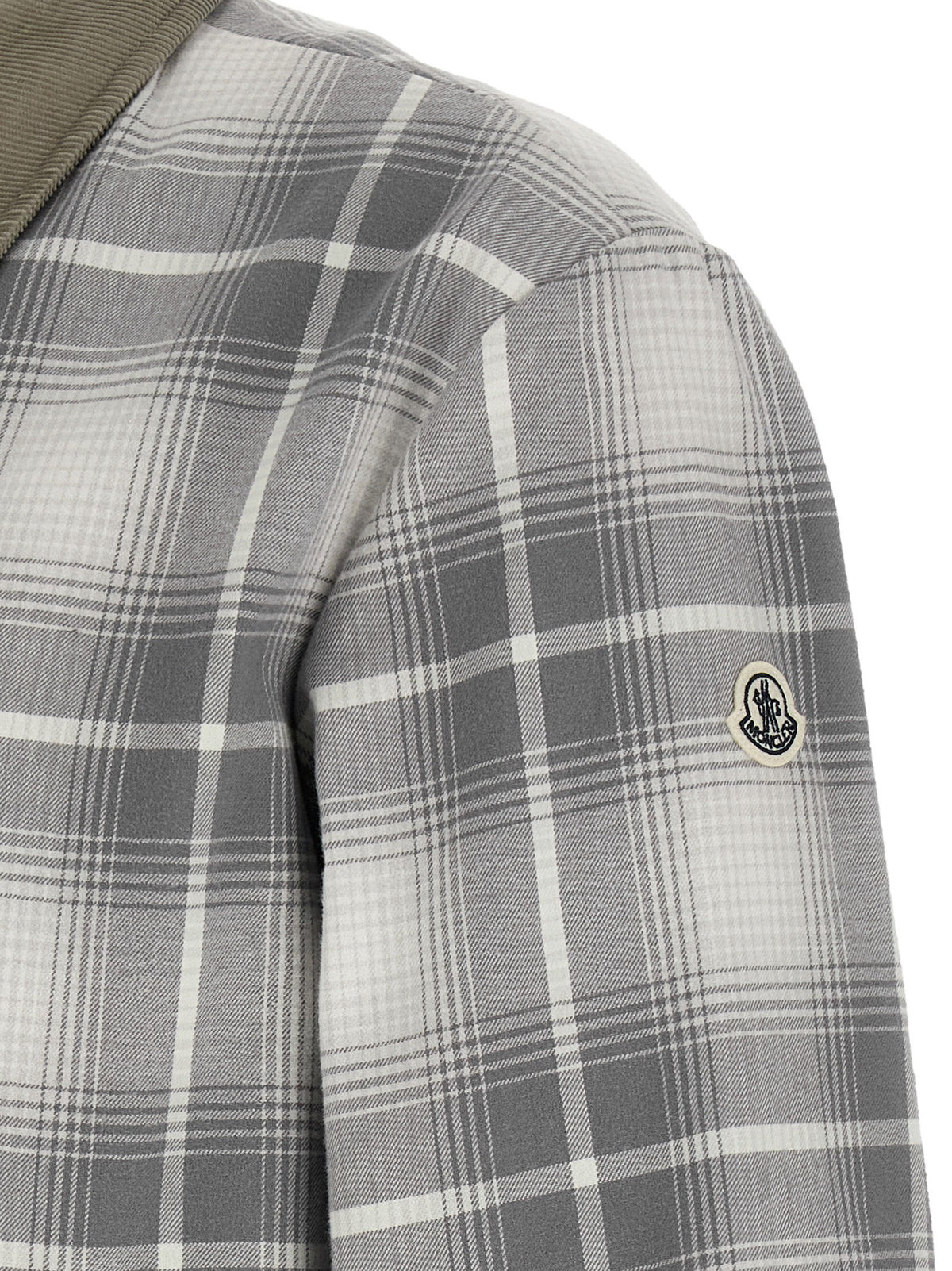 Elevate your style with the MONCLER GENIUS Gray Cotton Full-Length Jacket, a luxurious blend of urban sophistication and innovative design, crafted for the discerning individual.