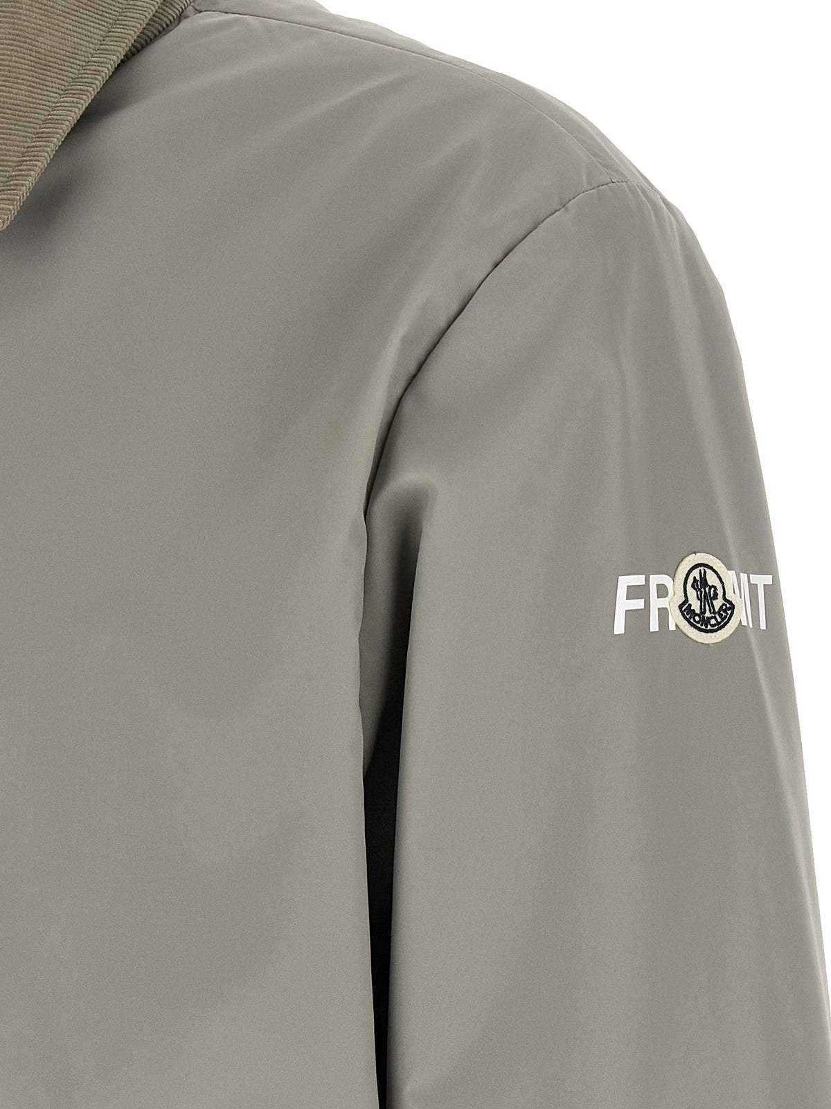 Elevate your style with the MONCLER GENIUS Gray Cotton Full-Length Jacket, a luxurious blend of urban sophistication and innovative design, perfect for the discerning individual.