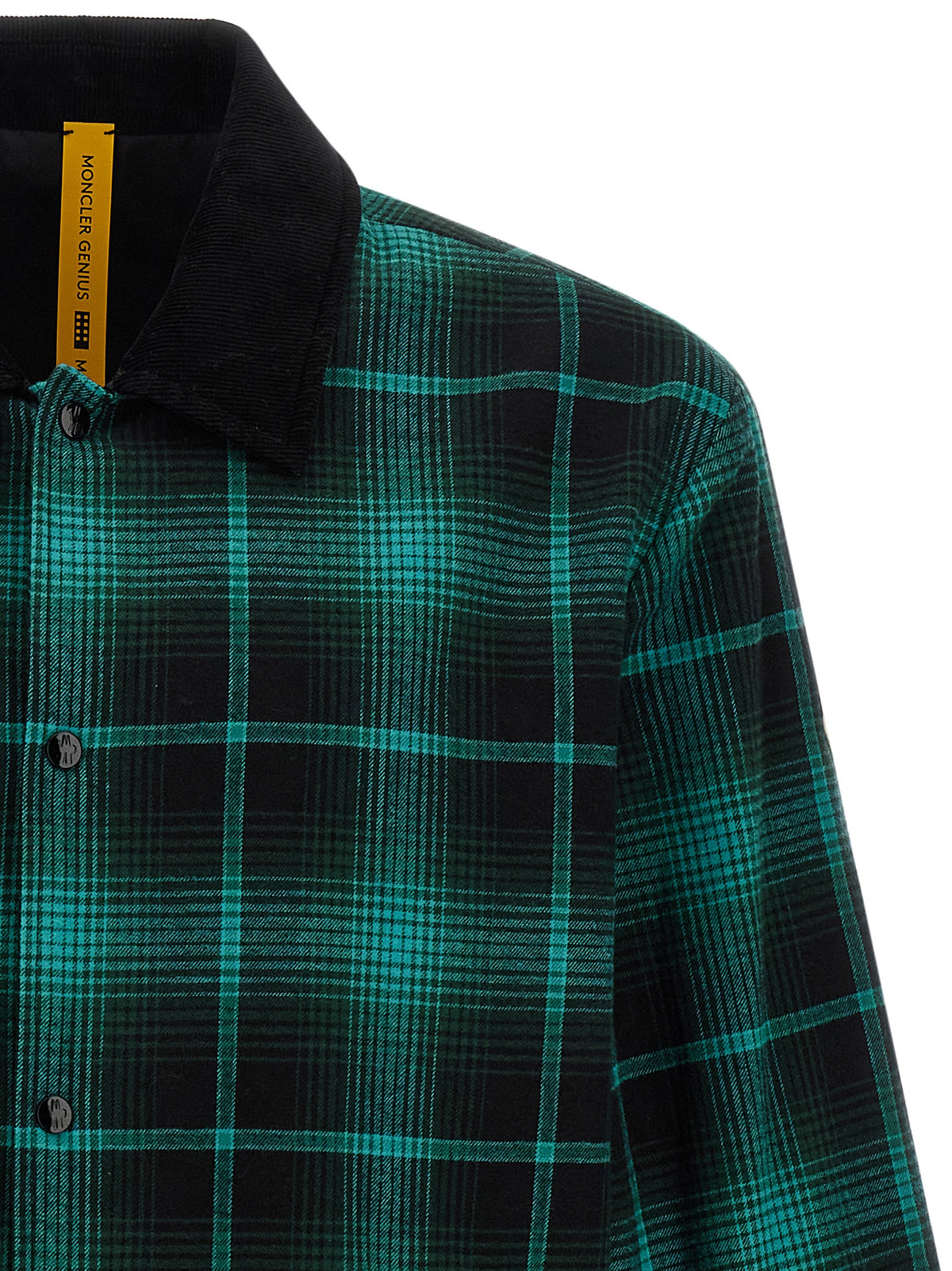Elevate your style with the Moncler Genius Bicolor Cotton Full-Length Jacket, a masterful blend of contemporary design and luxurious craftsmanship for the discerning individual.