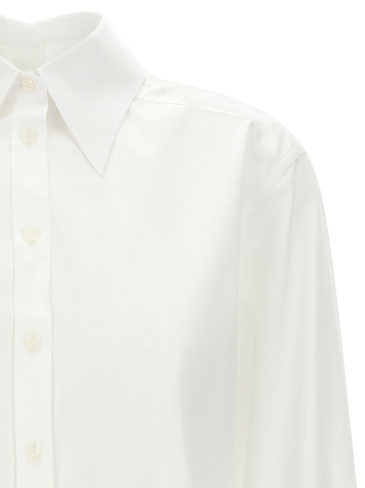 Indulge in the exquisite craftsmanship of the Dolce & Gabbana White Cotton Blouse, a timeless piece that embodies luxury and sophistication for every occasion.