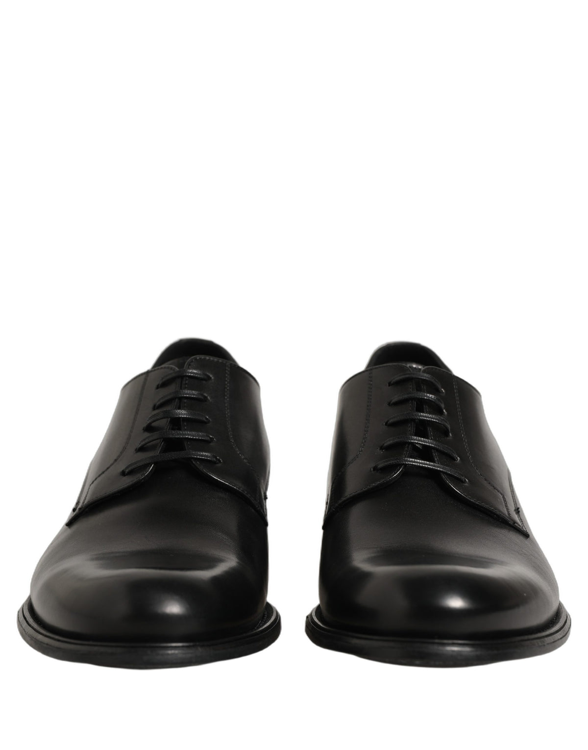 Indulge in the exquisite craftsmanship of Dolce & Gabbana's Black Calfskin Leather Derby Shoes, where timeless elegance meets unparalleled luxury for discerning tastes.