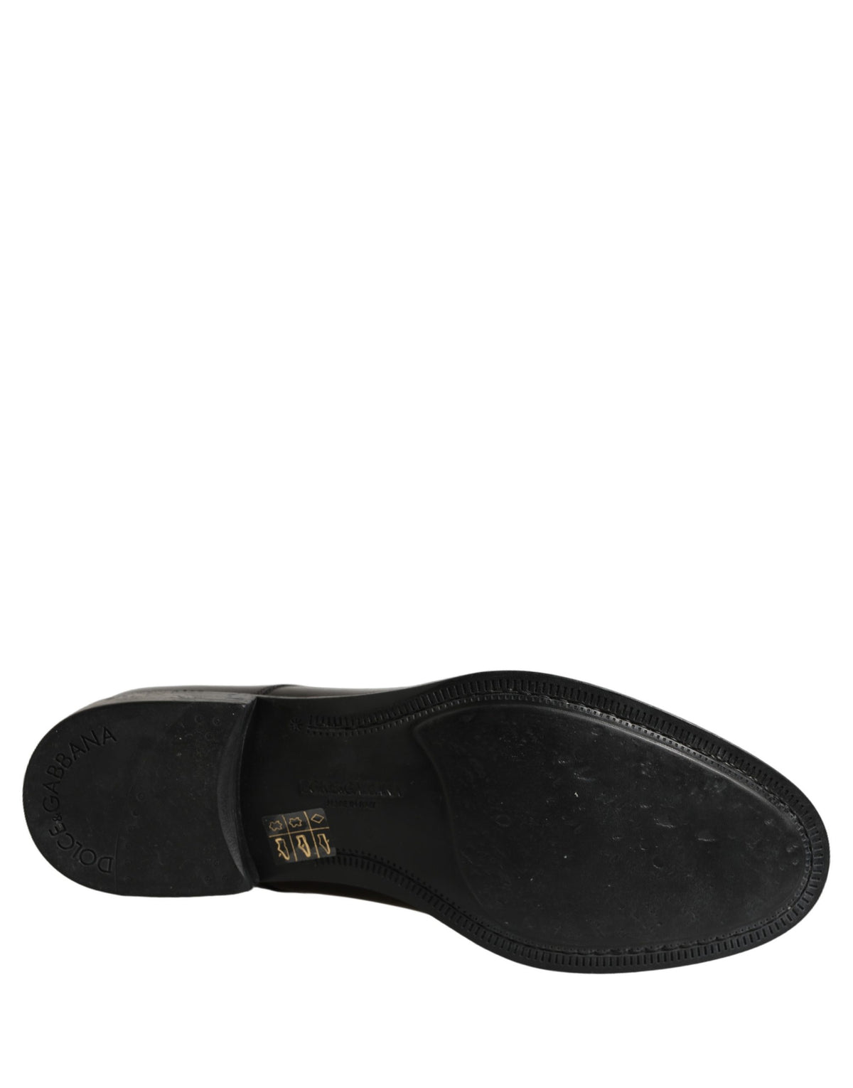 Indulge in the exquisite craftsmanship of Dolce & Gabbana's Black Calfskin Leather Derby shoes, a timeless statement of luxury and sophistication for discerning tastes.