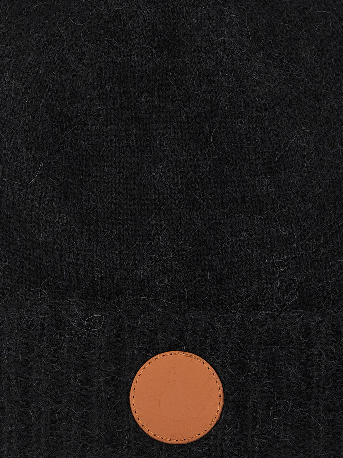 Indulge in the exquisite Vivienne Westwood Black Wool Beanie, crafted from a luxurious blend of alpaca and mohair, embodying timeless elegance and warmth for the discerning individual.