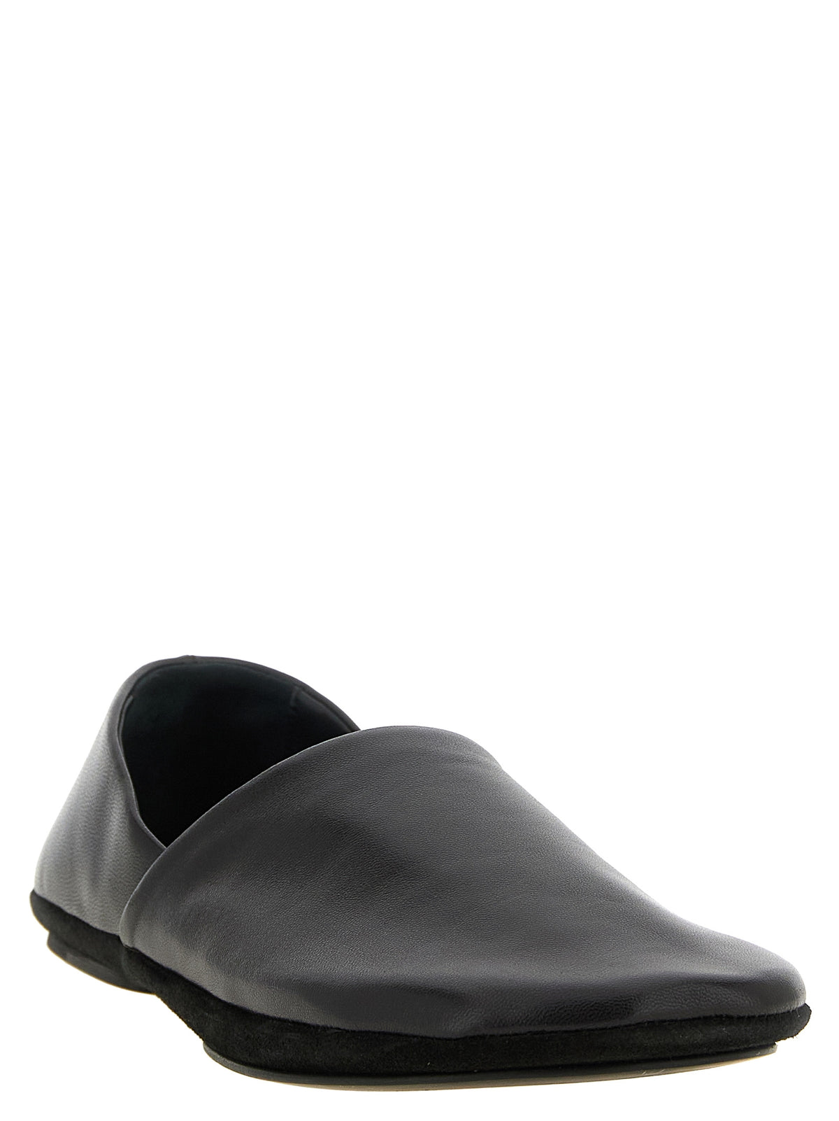 Indulge in the refined elegance of Lemaire's Black Lamb Leather Slip-On Loafers, where premium craftsmanship meets modern sophistication for the discerning individual.