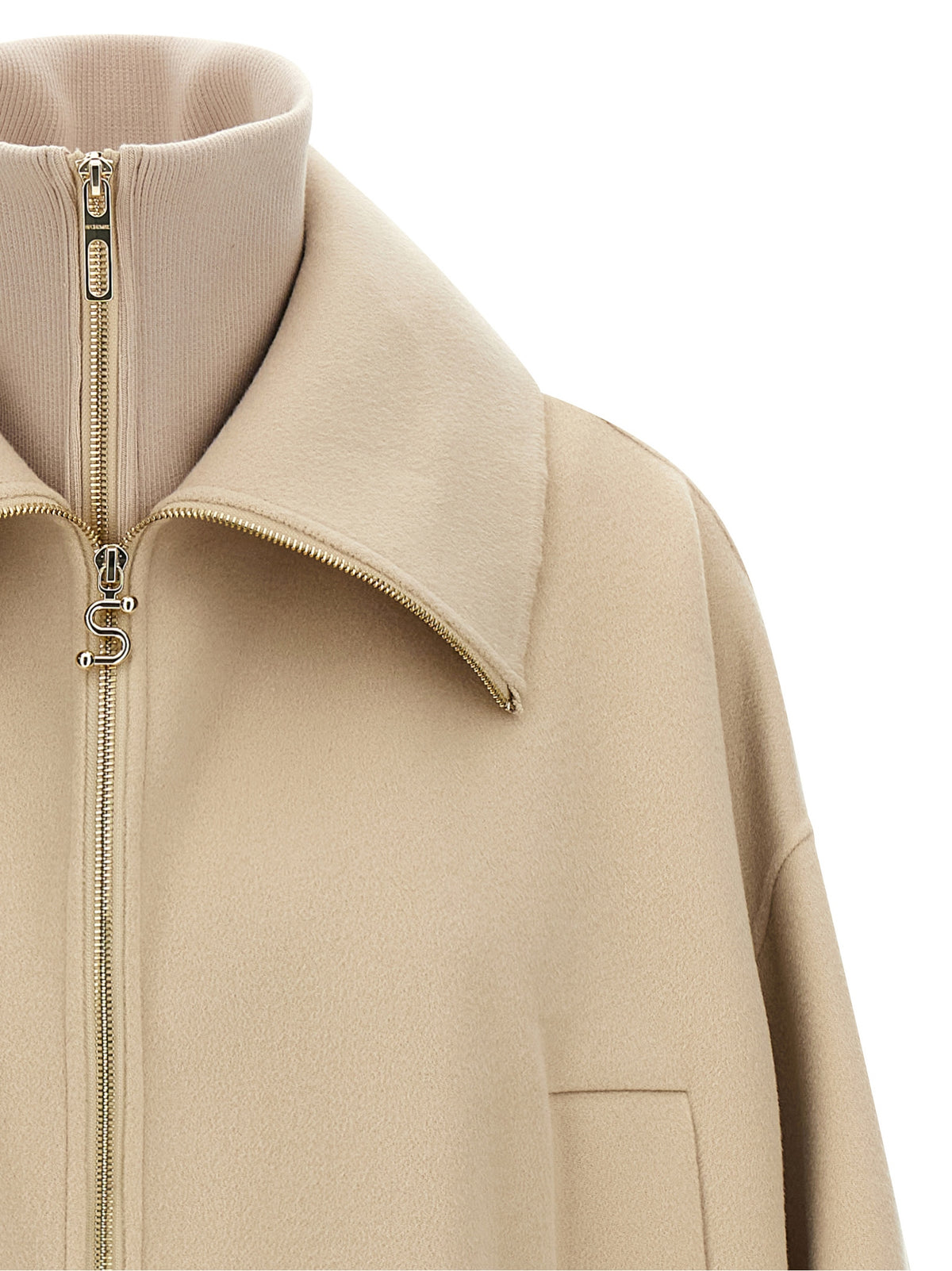 Discover the Sportmax Beige Wool Bomber, a luxurious statement piece crafted from pure virgin wool, embodying sophistication and versatility for the discerning individual.