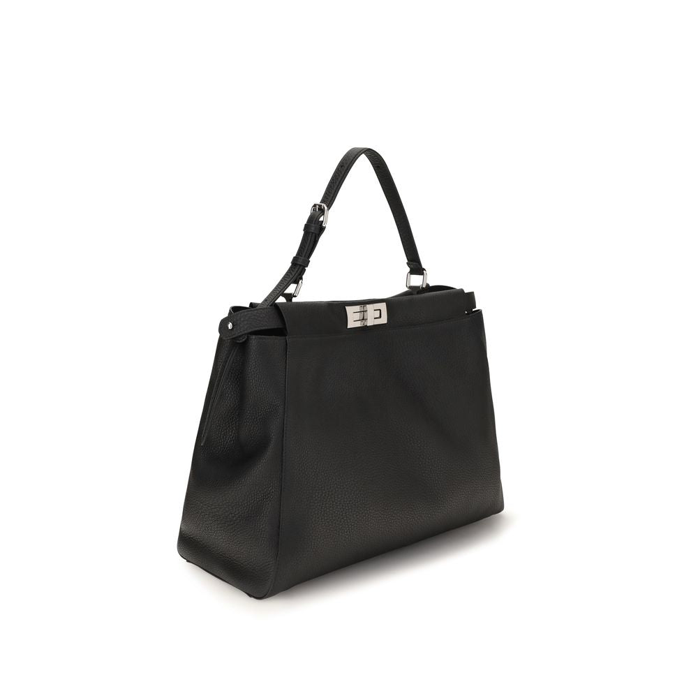 Discover the Fendi Black Calf Leather Bos Taurus Shoulder Bag, a masterpiece of Italian craftsmanship that redefines luxury with its elegant design and refined details.