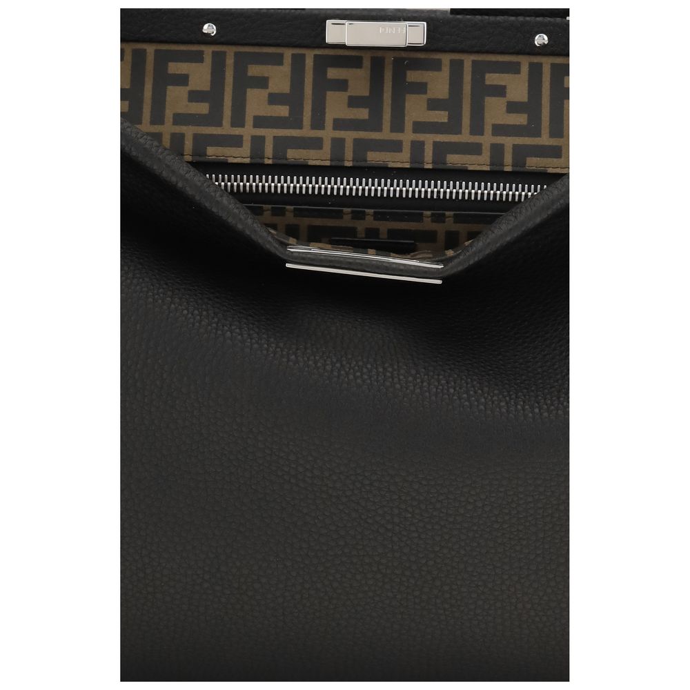 Elevate your style with the Fendi Black Calf Leather Bos Taurus Shoulder Bag, a masterpiece of Italian craftsmanship that embodies luxury and sophistication for the discerning individual.
