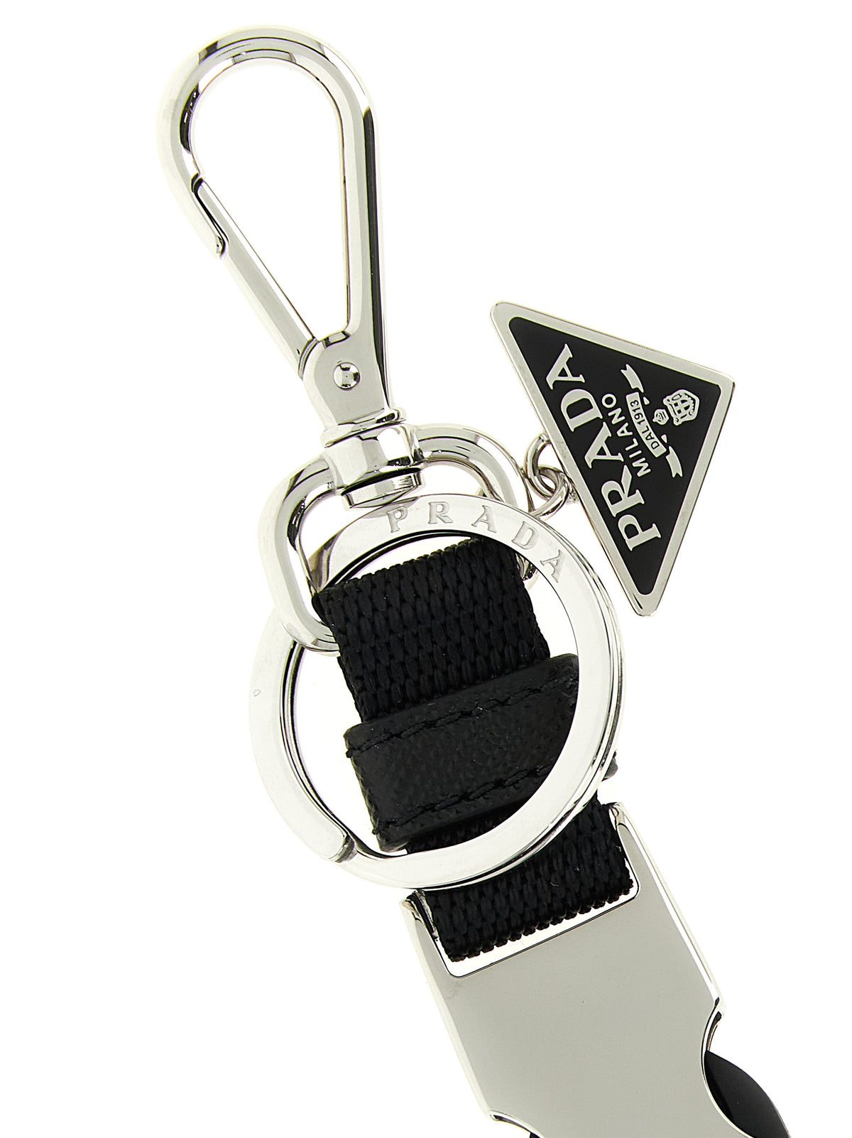 Elevate your accessory game with the Prada Black Stainless Steel Keychain, a fusion of sophisticated design and Italian craftsmanship that embodies timeless luxury.