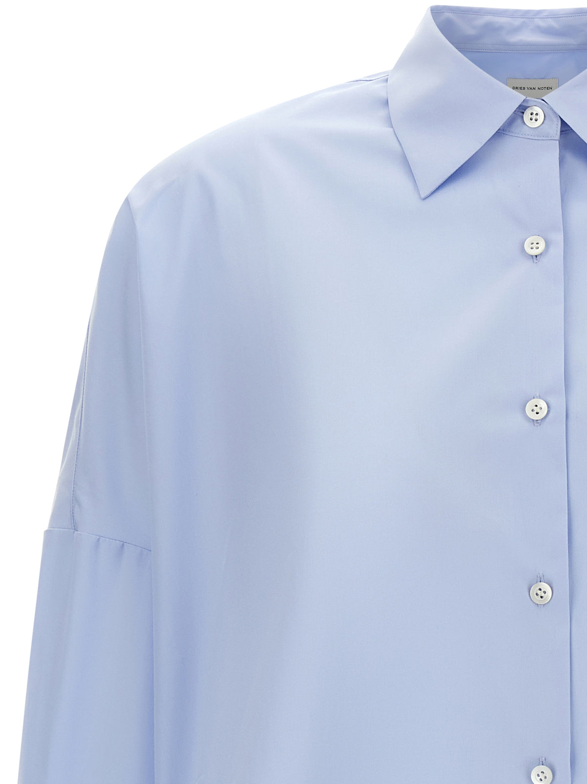 Elevate your wardrobe with the Dries Van Noten Blue Cotton Blouse, a sublime blend of minimalist elegance and impeccable craftsmanship, perfect for the discerning individual.