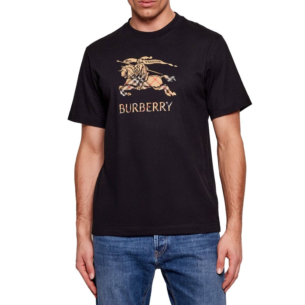 Indulge in the exquisite Burberry Black Cotton T-Shirt, a timeless piece of luxury crafted in Portugal, embodying sophistication and effortless style for the discerning individual.
