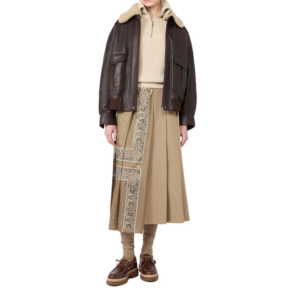 Indulge in the exquisite Max Mara Brown Lamb Leather Bomber, a masterpiece of craftsmanship and luxury, perfect for those who embrace elegance and sophistication.